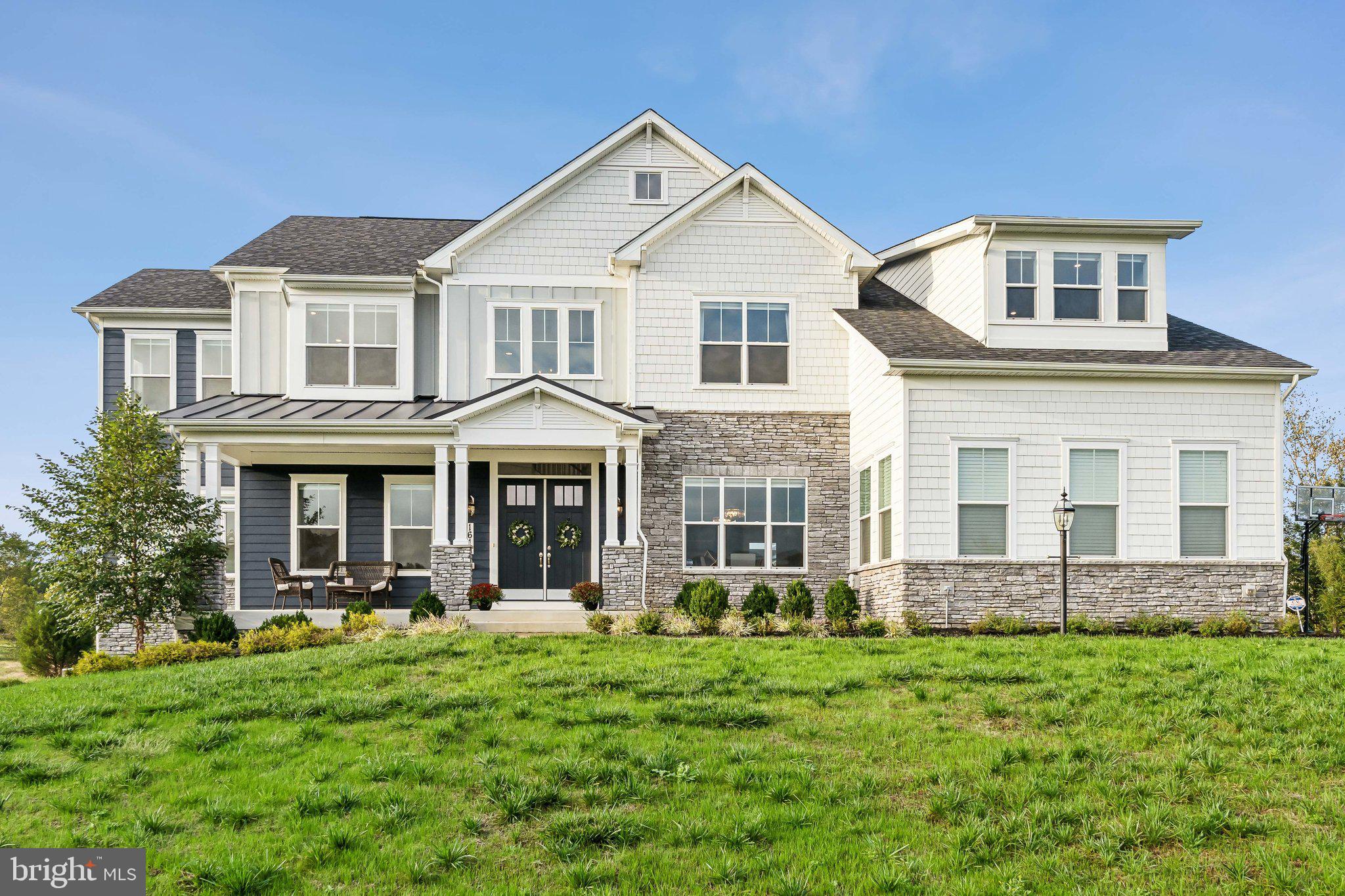 Nestled on 2 lush acres backing up to the scenic Renditions Golf Course, this spectacular 5-bedroom, 5.5-bath Craftsman home in Davidsonville offers a blend of luxury and natural beauty.  Located in a quiet cul-de-sac within an exclusive 24-home community, the property feels both open and private, offering the best of both worlds. Built in 2020, this home spanning over 6,500 sq ft boasts a grand two-story foyer, soaring 10-foot ceilings, hardwood floors, and high-end finishes throughout.  The heart of the home is the great room, where a sun-drenched family room flows seamlessly into the gourmet kitchen and breakfast nook.  The family room boasts coffered ceilings and a fireplace with floor to ceiling stone work.  The kitchen is an entertainer’s dream, with an oversized breakfast island, top-of-the-line stainless steel appliances including two wall ovens and abundant cabinetry and a convenient built-in desk.  Cooking and dining are enhanced by panoramic views from oversized windows overlooking the golf course - perfect for soaking in the breathtaking sunsets year-round.  The separate formal dining room offers an intimate space for entertaining fitting a table for 8+.  A sunroom, office/den and half bath round out the main level. 

Upstairs, the luxurious primary suite impresses with a serene sitting area, walk-in closet and a spa-like en-suite bath with a soaking tub, step-in shower and two water closets.  The suite also boasts stunning views of the golf course and the verdant forest along the Patuxent River.  Primary suite also has a wet bar rough-in- perfect for future coffee bar.  A connected room off the primary bedroom closet offers flexibility as either a nursery, extended closet or another office.  Each of the four spacious bedrooms offers its own en-suite bath. The laundry room is conveniently located on the bedroom levels adding to the home's effortless functionality.  

Downstairs, the finished lower level is ideal for entertaining, featuring a state-of-the-art movie room wired for surround sound and spacious family/rec room. One additional bedroom, full bath and bonus room.  The attached three-car garage provides ample storage space and easy access to the home, ensuring both convenience and security.  Outside, the expansive lot offers endless possibilities, whether you envision a swimming pool, basketball court, or an outdoor gathering space for family and friends.

Perfectly situated between Washington, D.C. and Baltimore, and just 15 minutes from Annapolis, Bowie, and Crofton, this exceptional home combines sophisticated living with unbeatable convenience.