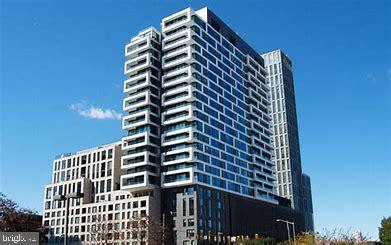 Modern, high end condo in recently built the Verse.   Unit has never been lived in!  New condo ready for tenant in the Tysons BORO community. 
Great views from the 19th floor!   Large 1 bedroom, 1 full bath condo is move in ready.  Hardwood floors, open kitchen with large island, high quality countertops, high end stainless steel appliances, abundant upgraded cabinet space.  Plenty of natural light in the living room/kitchen with floor to ceiling windows.  Luxury bath with porcelain tile in bathrooms.  Washer and dryer in unit.  Parking garage, Bike storage and repair area.  Convenient shopping at Whole Foods Market , walk to Greensboro Metro Station, walk to shopping and restaurant and  movie theater.   Fitness center, access to outdoor swimming pool, outdoor patio area and 24 hour concierge.  Entertain family and friends in the billiard and game room.   A large “skypark” features badminton, movies, grill and bar, firepits and ample seating with some great views.  Close, easy access to 495, Rt 123 and Dulles Toll Rd.




A guest suite with hotel like amenities.
Secure parking garage with car charging stations.
Restaurant on the street level floor.