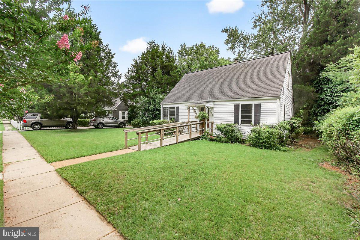 Welcome to 702 Westover Road. This freshly painted 4-bedroom, 1-bathroom Cape Cod is situated on a well-maintained and spacious lot in the desirable Sudbrook Park neighborhood.  The home offers fresh paint throughout, newly refinished hardwood floors, and new kitchen flooring.  The main floor offers abundant natural light, a generous living room, an eat-in kitchen with ample cabinetry and counter space, two bedrooms, and a full bath. The kitchen provides direct access to a bright sunroom overlooking the expansive rear yard. Upstairs, there are two additional bedrooms with hardwood flooring. The exterior features extensive green space offering multiple possibilities for outdoor enjoyment. This move-in-ready property is conveniently located near shopping, restaurants, and major commuter routes, making it an excellent option for new homeowners seeking both comfort and accessibility.