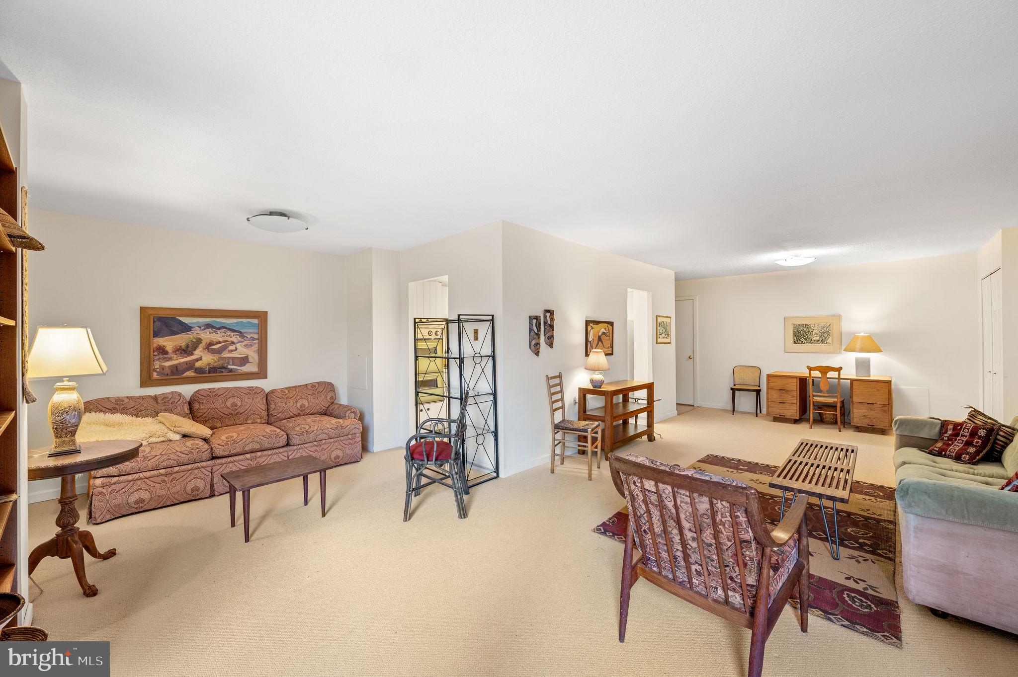 Welcome to Unit #818 at the Strath Haven Condominium, a spacious two-bedroom, two full bath condo. This corner apartment faces South and West with a large inset balcony facing Yale Avenue that provides a bonus outdoor space with privacy. While typical two bedroom apartments in the building are 1,050 square feet, this end unit is a more ample 1,210 square feet. The unit is laid out with a large living room and a separate dining room area, offering access to the balcony through a glass sliding door. The kitchen has the original cabinets and appliances from the late 60’s in very good condition! The kitchen is larger than the usual kitchens in the two-bedroom units and it has room for a breakfast table and chairs. The primary bedroom faces south and it is filled with natural light.  It has a beautiful view of the stately copper beech tree and the community gardens beyond. This bedroom has an en suite bathroom with a stall shower and generous closet space. The second bedroom has plenty of closet space and a full bathroom across the hall. The apartment has a handy laundry closet with a washer and dryer. A second large closet can double as a coat closet and a pantry. Unit #818 includes a very desirable carport, #8, located in the parking lot on the Yale Avenue side of the building. Carports are highly sought-after, and while they can be sold privately between community owners, they rarely change hands. The Strath Haven Condominium is recognized as a Gold Star Community by the Community Associations Institute. It is conveniently located near the town center of Swarthmore with easy access to Swarthmore College, the Scott Arboretum, shops, and the regional train station. The monthly condo fee is the most comprehensive in the area and includes electricity, gas, water, sewer, heating, and air conditioning. The grounds maintenance, building maintenance, outdoor pool, library, meeting room, hobby workshop, and a van for convenient shopping are included in the monthly fee as well. The only additional expense is cable/internet. These corner units are very desirable!