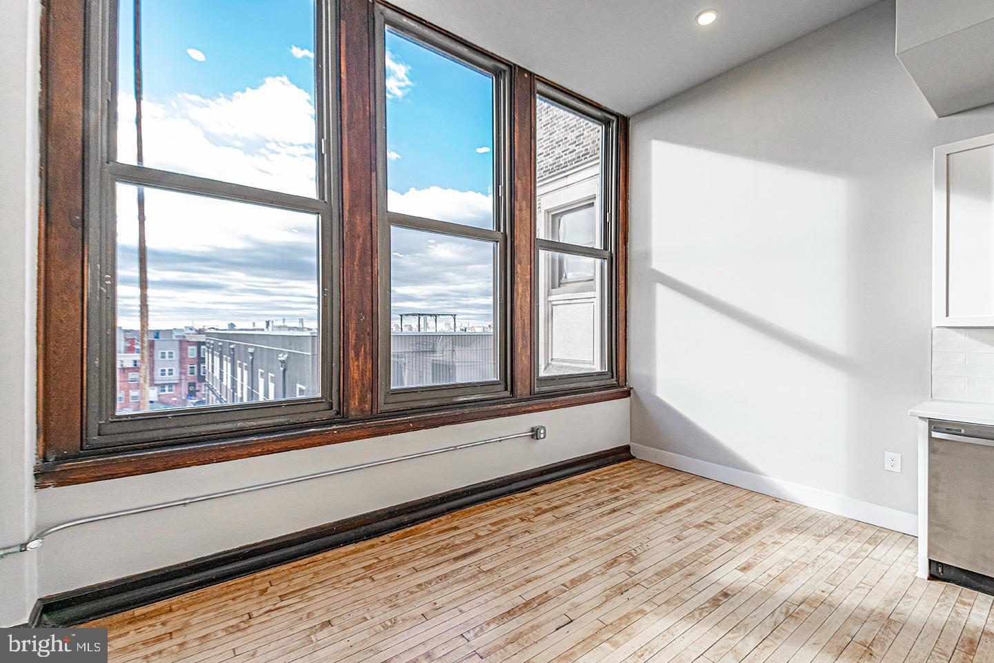 *Available 6/1!*

Don't miss this breathtaking studio, 1 bathroom with unobstructed views of the Philadelphia skyline! This unit has everything: hardwood floors, mini split system heating/cooling, recessed lighting, washer/dryer in unit and massive windows! The kitchen has white cabinets with sleek hardware against textured white subway tile back splash, quartz counter top, a garbage disposal and stainless steel dishwasher, microwave, refrigerator and electric range. The bathroom features a vanity with the same counter top that matches the kitchen and shower/tub with a sliding glass door. The Walter George Smith Public School, listed on the National Register of Historic Places, has undergone an amazing transformation to bring you these brand new luxury apartments! Each unit features high end finishes while preserving it's historic character such as the chalkboards, original trim and closets, and overall unique floor plan. All tenants will have access to the three outdoor spaces (over half an acre combined!) on ground floor and mezzanine patios, and roof deck with stellar skyline views! Located at 19th and Wharton in Point Breeze, you'll be minutes from American Sardine Bar, Graduate Hospital, East Passyunk and MORE!

Lease Terms: Generally, 1st month, and 1 month security deposit due at, or prior to, lease signing. Other terms may be required by Landlord such as last month’s rent upfront. $65 application fee per applicant. Residents Responsible for Electric Usage & Flat Monthly Water/AC/Heat fee of $100. Additional fees or requirements may be applicable for units with Homeowners or Condo Associations. Landlord Requirements: Applicants to make 3x the monthly rent in verifiable gross income, credit history to be considered, no evictions within the past 5 years, and must have a verifiable rental history with on-time rental payments. Exceptions to this criteria may exist under the law and will be considered. Cosigners will be considered.

*Price reflects the net effective rent after a 1-month credit is applied to a 13-month lease at $1,245/mo.
*Sorry, no cats
*1 dog <35 lbs permitted with owner approval + $50/mo pet fee
*Listing photos are of a similar unit in building, finishes will match, layout may differ slightly