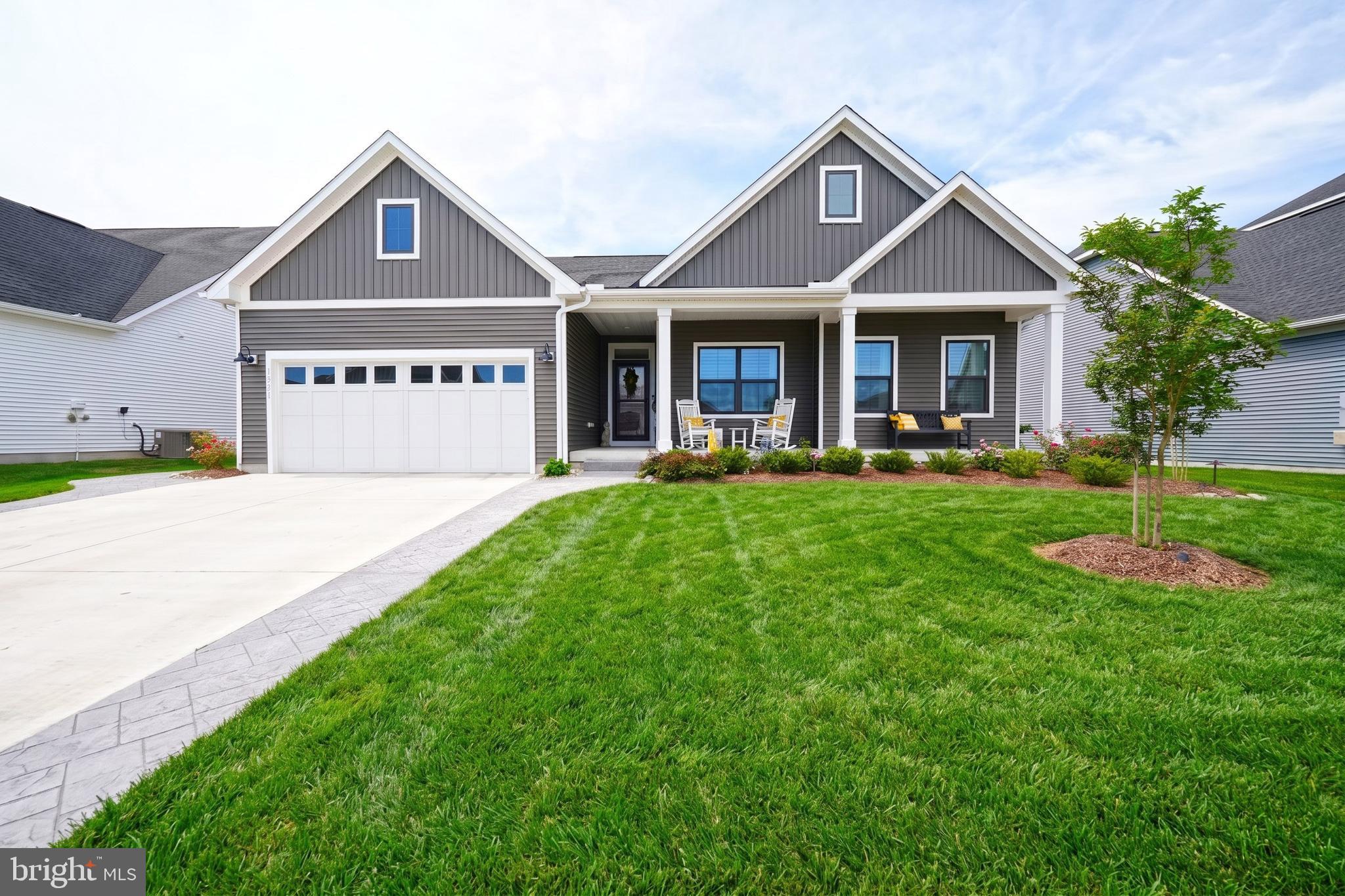Why wait for new construction when you can move right into this beautifully upgraded, like-new
Cumberland model built in 2024 in the sought-after community of Ocean Meadows? This
exceptional home offers 4 bedrooms, 3 full baths, a 2-car garage, and a finished basement
complete with a spacious bedroom and full bath—ideal for guests, multigenerational living, or a
private retreat.
The desirable split-bedroom floor plan provides privacy for the luxurious primary suite, while
the open-concept kitchen, dining area, and family room create the perfect space for entertaining
and everyday living. The gourmet kitchen features an oversized center island, abundant
cabinetry, and a generously sized pantry. Elegant tray ceilings enhance both the family room and
the primary suite, where you'll also find two walk-in closets and a spa-inspired ensuite bath with
dual vanities.
This home is loaded with thoughtful upgrades, including custom wood shelving in both the
basement and garage, custom molding in the office/fourth bedroom, new ceiling fans in all
bedrooms and the office, irrigation with a private well, professionally designed landscaping with
landscape lighting, a stamped concrete driveway border and side walkway, a white vinyl fenced
backyard, and double-width walk-up basement stairs leading to the fenced backyard. The
finished basement offers exceptional additional living space while still providing abundant
unfinished storage.
Relax on the welcoming front porch or unwind on the covered rear porch overlooking the private
backyard that backs to a peaceful wooded buffer.
Ocean Meadows offers outstanding amenities including a clubhouse with kitchen, fitness center,
billiards room, outdoor pool, lawn care, and snow removal, allowing for low-maintenance living.
Ideally located just minutes from the beaches of Lewes and Rehoboth, downtown Lewes,
shopping, restaurants, and everyday conveniences, you'll enjoy the perfect blend of coastal
accessibility and a tranquil country setting.
This meticulously maintained, move-in-ready home truly offers the best of luxury, comfort, and
convenience.