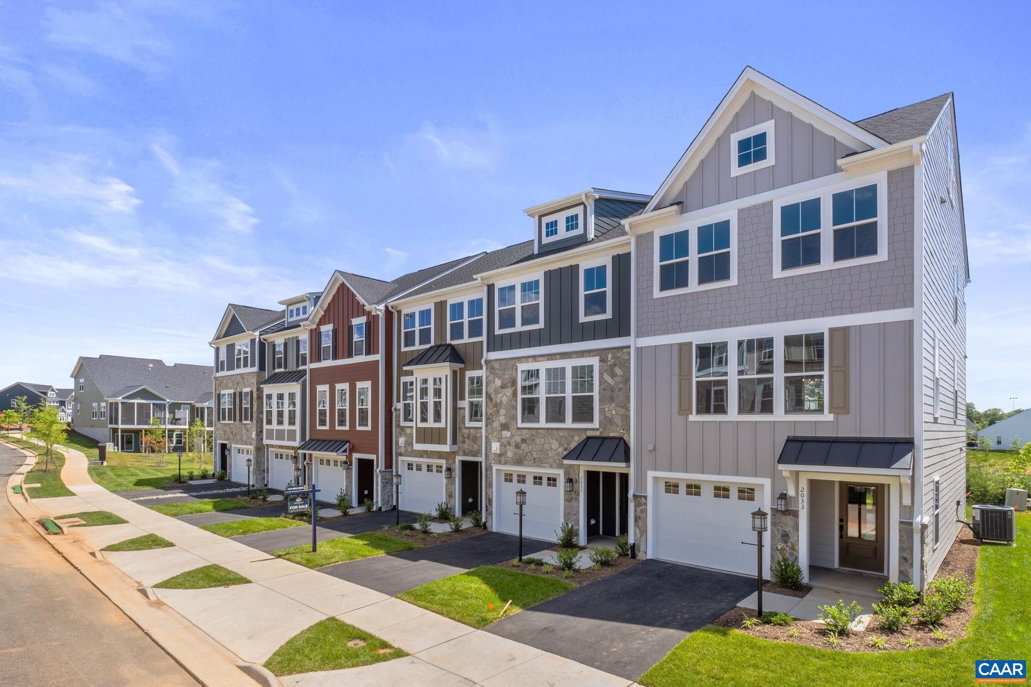 Located in a newly released section of Creekwood Village in Waynesboro, The Dahlia offers a well-balanced three-level layout with 2,095 finished square feet. Under construction for an early Fall completion, this townhome includes four bedrooms, three and a half bathrooms, and an attached one-car garage. The entry level features a private bedroom and full bath, ideal for flexible living needs. On the main floor, an open-concept family room connects to a spacious kitchen with an island, pantry, and adjacent dining area, plus a half bath and deck. Upstairs, the primary suite includes a private bath and walk-in closet, while two additional bedrooms, a full bath, and laundry round out the top floor. The first homes in this section are estimated for completion in late summer. Creekwood Village offers low-maintenance living in a scenic Shenandoah Valley setting, with convenient access to nearby shopping, dining, and outdoor recreation. Photos shown are of a similar home and may include optional or upgraded features. Virtual staging is provided for inspirational purposes only.,Painted Cabinets,Quartz Counter,Wood Cabinets