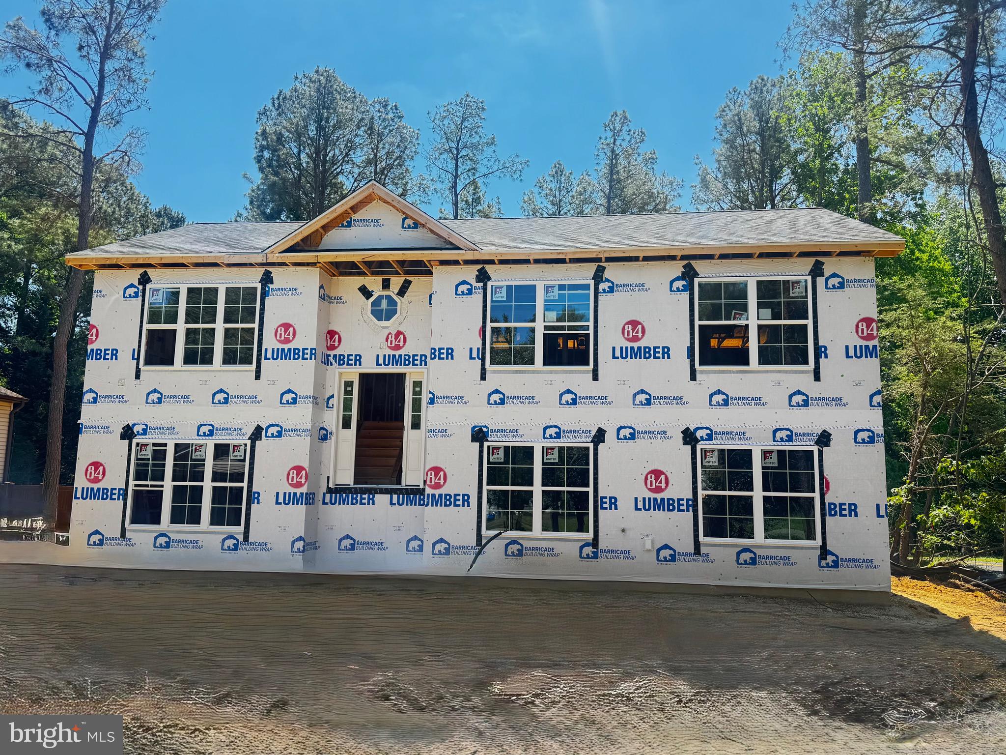 New custom home that boasts four bedrooms and three full bathrooms on a level corner lot is under construction and should be ready by the end of June. It features two distinct living spaces. The upper level houses a living room, dining room, and kitchen -equipped with granite countertops, an island, recessed lighting, stainless steel appliances, pantry and  vinyl plank flooring. A primary bedroom offers a spacious walk-in closet and a luxurious bath. Another bedroom and full bath complete this level. On the ground floor, there’s a family room, an additional bedroom, a laundry room, and a private suite. The suite with its own entrance includes a family room, kitchen, bedroom, full bath, and laundry room,. ***Pictures shown are from a recent home. There is still time to select some options. Enjoy this summer with private beaches and lake plus all the other neighborhood amenities. Amazing neighborhood amenities: private beaches,(DRIFTWOOD BEACH (Intersection of Catalina Dr & Beach Dr) and (SEAHORSE BEACH (Golden West Way) , Private Lake with beach and picnic area (394 Thunderbird Dr) Clubhouse (500 Clubhouse Dr) Neighborhood Garden (Intersection of Catalina Dr & Algonquin Trl) Horseshoe pits (Across From Ponderosa Ct) Airport (Intersection of Side Saddle Dr & Double Tree Lane) Campground (295 Thunderbird Dr., Opens: April 1st - Closes: October 31st) Picnic areas Tot lot, Classes and Groups: Fit Club, Sewing Club Garden Committee ONLY .5 miles from the beginning of the neighborhood. Close to schools, shopping, restaurants and popular activities. Navair - 13.3 miles. Washington DC - 60 miles Activities: Anne Marie Sculpture Garden & Arts Center 3.7 miles Calvert Cliffs State Park - 2.6 miles Calvert Marine Museum - 4.9 miles Flag Ponds Nature Park - 7.3 miles Solomons Island 5.6 miles. *Builder has paid 1/3 of County Excise Tax. Buyer responsible for the next 2 payments which are due over the following 2 years. **Taxes will be estimated based on offer amounts

More pictures coming soon.