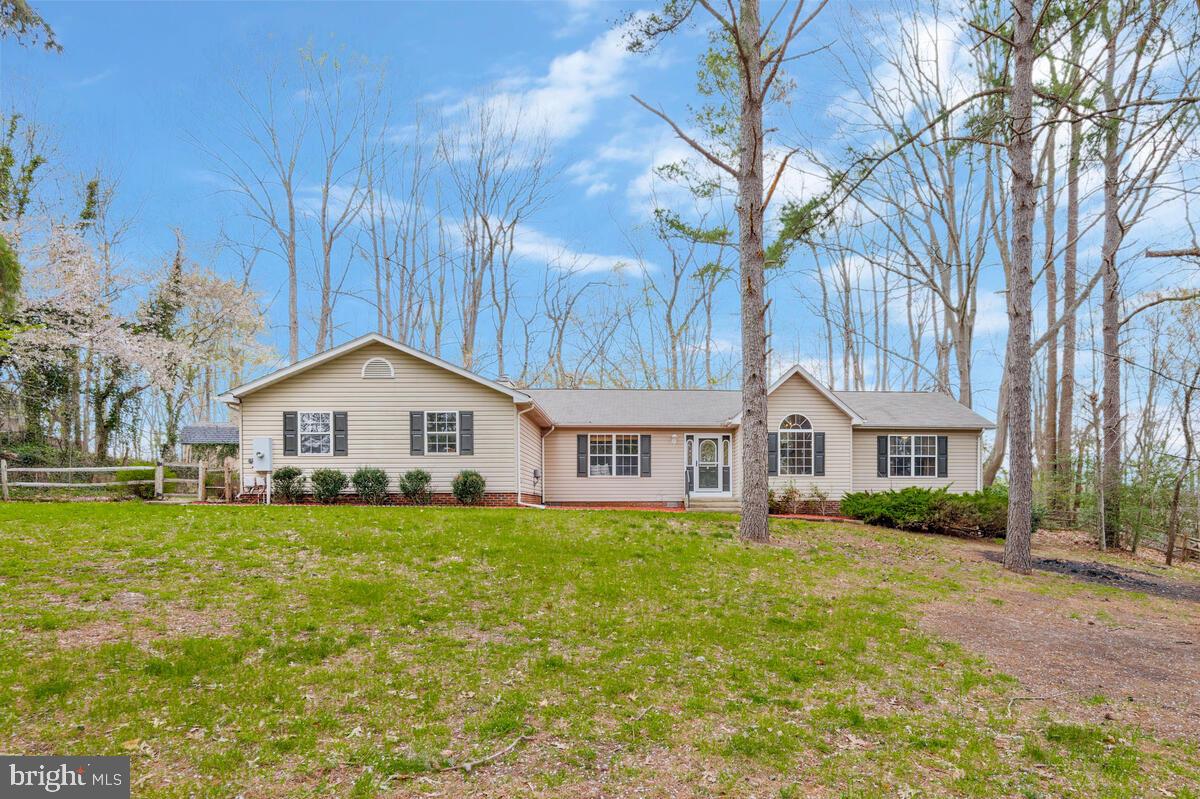 Offer Deadline 6pm Saturday 4/12/2025
 Welcome home —a private retreat nestled on 10.95 acres of serene, wooded beauty. This stunning 3-bedroom, 2.5-bathroom home offers the perfect blend of nature and contemporary living. Step inside to a bright and airy open-concept kitchen and living area designed for both entertaining and everyday ease. The kitchen boasts stylish finishes, ample counter space, and seamless flow into the living area—ideal for gatherings around the fireplace or enjoying the peaceful views through expansive windows. The spacious primary suite provides a relaxing escape with a well-appointed en-suite bath, while two additional bedrooms offer flexibility for all your needs. Outside, your private wooded acreage invites endless possibilities—whether it's exploring nature, creating your own outdoor oasis, or simply enjoying the tranquility. Tucked away in a quiet cul-de-sac yet conveniently located near local amenities, this home is a rare gem for those seeking space, privacy, and modern comfort. 📍 Don’t miss out—schedule your showing today!