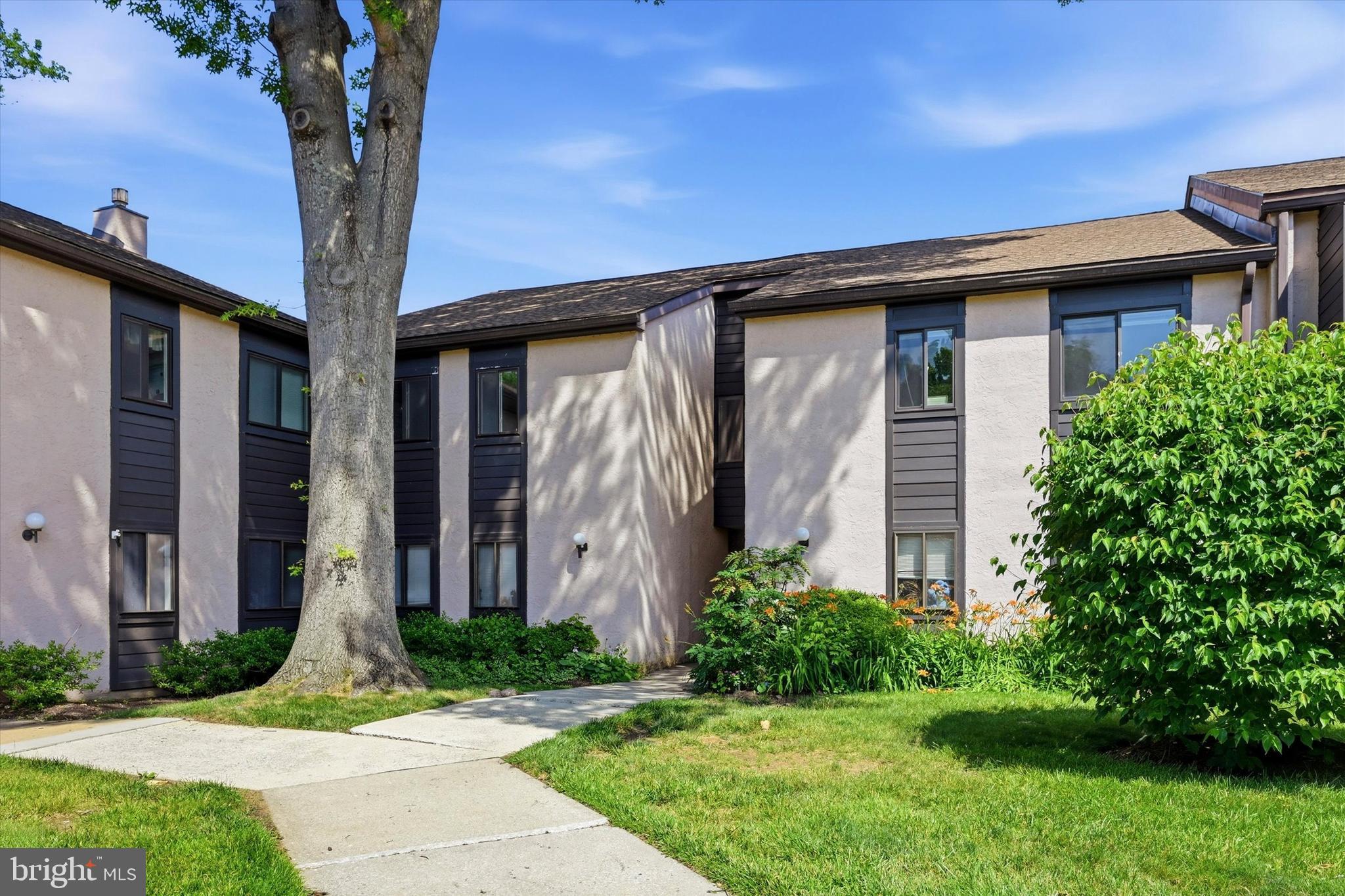 Welcome Home to this beautifully remodeled home located in a premium location in the sought-after community of Painters Crossing, and in the Award-winning Unionville–Chadds Ford School District. Here you will enjoy a carefree lifestyle with a Condo Association that offers an exceptional value with pool, tennis court, playground, picnic area and walking trails. Also included in your Condo Fee is heat, hot water, trash, landscaping, snow removal, and exterior maintenance (including roof and deck), delivering truly low-maintenance living.  Just inside the front door the welcoming entry nook, spacious enough for a small table, shoe cubby, etc, greets you. Upstairs you will find the bright, open, flowing floor plan.  Here you will enjoy the large, sunlit living room with a charming custom brick, with slate hearth and custom mantel, focal point offering a candle light cozy feeling to the main living space (fireplace can be converted to electric or gas fireplace). Access to the balcony with a beautiful view of the nearby wooded area will also be found here.  Just off the living room you will find the bright and cheerful, newly updated, dining room with a custom workspace and cabinets for additional storage, ideal for a coffee station and serving area. This home showcases a newly remodeled kitchen offering a beautiful tile backsplash, stainless appliances and custom cabinetry and counter space surrounding the washer/dryer area maximizing your storage and counter space.  Just down the hall from the family room you will find the spacious owner's suite with generous closet space and a beautifully updated ensuite bathroom with walk-in tile shower and stylish barn style shower door and hardware.  A second generous sized, sunlit bedroom will be found here along with another room that can serve as the 3rd bedroom, an office or a guest room.  You will also find the second full bathroom with tub here.   This home offers exceptional storage options, including a private storage locker approximately 4’x4’  floor to ceiling in a nearby building.  
Enjoy peaceful Brandywine Valley surroundings, with Longwood Gardens, Brandywine River Museum, Brandywine State Park, local wineries, breweries, golf courses, and dining from fine to casual, all nearby.  Tax free Delaware is a short and easy commute.  Routes 1 & 202 are within minutes for ease of travel.
The fresh paint throughout, all new flooring and the numerous other recent upgrades make this a true move-in ready home so all you have to do is unpack your boxes!! Don’t wait….schedule your visit today and you won’t be disappointed!
.