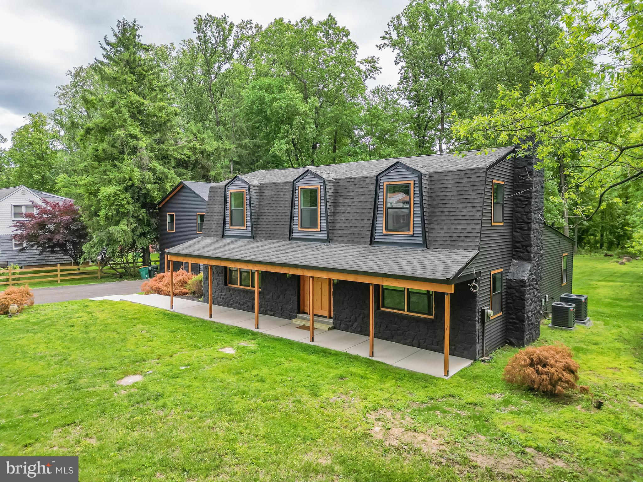 Welcome to a truly exceptional fully reimagined estate in the heart of Bucks County, where timeless craftsmanship meets modern luxury on 1.5 private acres within the highly sought-after Council Rock School District. Taken completely down to the studs and rebuilt to C2 “new construction” standards, this stunning property offers  3,771 square feet of beautifully finished living space, plus an additional 378-square-foot unfinished basement ready for storage, a gym, or future expansion.

Designed with both elegance and functionality in mind, the main residence features 5 spacious bedrooms and 3.5 designer bathrooms, complemented by an expansive open-concept layout ideal for modern living and entertaining. Every detail has been thoughtfully curated, from the real cedarwood accents throughout to the imported marble tile from Spain, creating a warm yet sophisticated aesthetic.

The chef’s kitchen flows seamlessly into the main living and dining areas, anchored by a charming working fireplace and filled with natural light from all-new windows. A dedicated laundry room with custom cabinetry adds everyday convenience, while dual-zoned HVAC ensures comfort throughout the home year-round.

No expense was spared in the complete transformation of this property, including all-new framing, plumbing, electrical, drywall, roofing, siding, sheeting, HVAC systems, kitchens, and bathrooms. The home is also prewired for alarm and security camera systems for added peace of mind.

Adding even more versatility is the detached structure featuring a 2-car garage and an impressive 672-square-foot loft space above — perfect for a home office, studio, guest suite, gym, or future in-law accommodations.

Ideally located just 5 minutes from the shops and restaurants of Newtown’s State Street, moments from Tyler State Park, and less than 10 minutes to I-95, this one-of-a-kind property offers the perfect blend of luxury, privacy, and convenience.

A rare opportunity to own essentially brand-new construction in one of Bucks County’s most desirable locations.

Showings will start the weekend of May 29th. Professional photos to come.