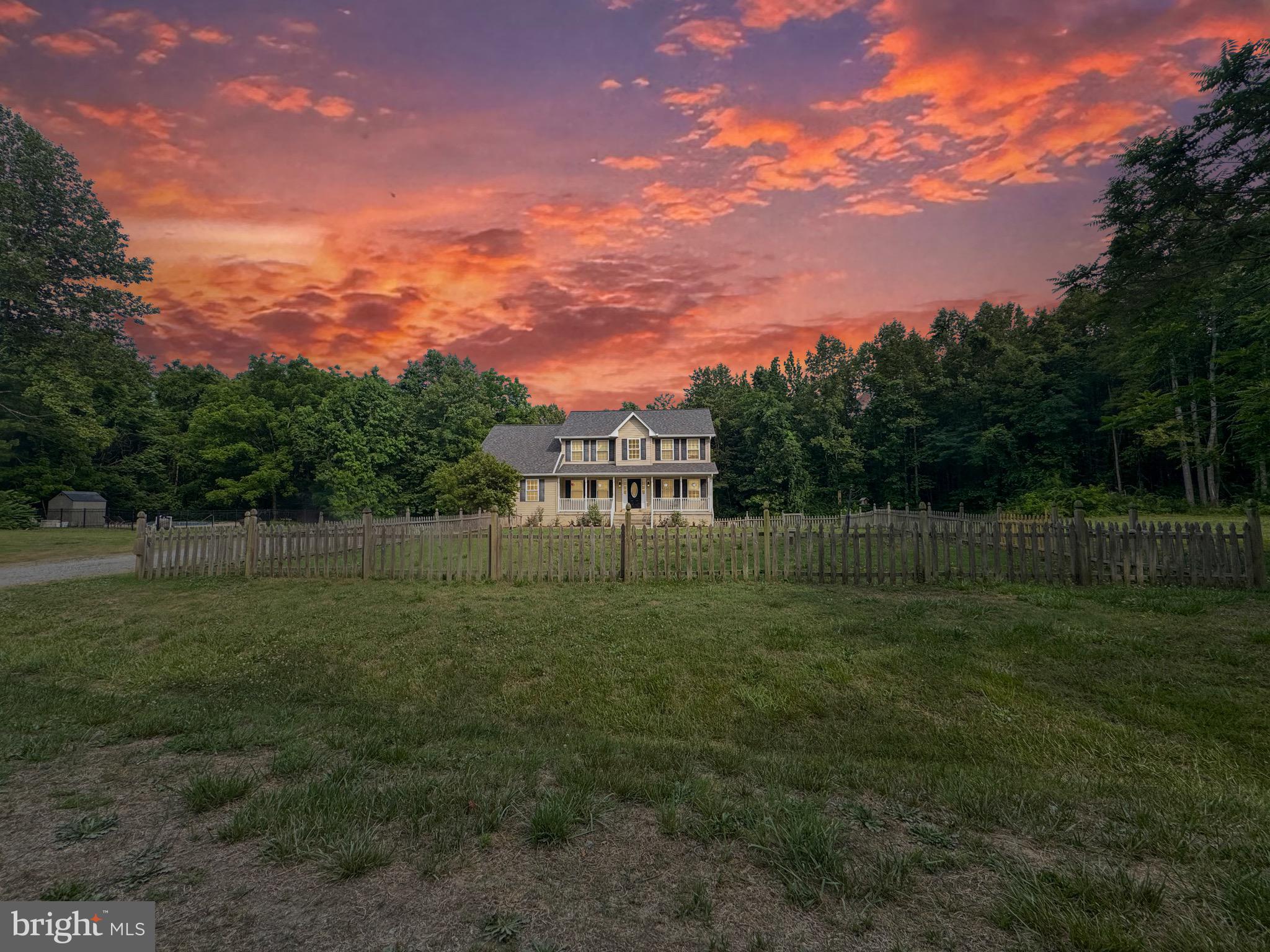 Welcome HOME to 12041 Mitcheltree Lane, where space, privacy, and lifestyle come together on 15.5 breathtaking acres in King George, Virginia. Whether you are looking for your homesteading dream or just looking for a property away from it all, this home has you covered! This stunning 6-bedroom, 3.5-bath Colonial is tucked back on a private road, surrounded by mature trees, and designed for the one that wants it all.
Step inside to a freshly painted main level that flows effortlessly from a formal living room and dining separated by beautiful barn doors to a home office and the beautiful eat in kitchen featuring double wall ovens, a gas range, stainless steel appliances, a center island,  pantry, and all the space you need to gather and entertain.  Off of the kitchen is the large family room with a gas fireplace and access to your private deck overlooking your property.  A convenient mudroom off the 2-car attached garage rounds out the main floor perfectly. 
Upstairs, you'll find four bedrooms including a oversized primary suite with a full bath, and its own room with two walk-in closets, easily could be the closet of your dreams. The upper level also features a convenient laundry room, keeping life organized and easy with minimal carrying. 
The fully finished walkout basement is a world of its own; two additional rooms (Septic is suitable for 4 Bedrooms), a kitchenette, and a recreation area making it ideal for guests,  in laws , a home gym, or the ultimate hangout space.
Outside is where this property truly shines. A stunning fenced-in pool with generous entertaining space, a garden, a chicken coop, blossoming fruit trees, and professionally landscaped curb appeal to create an outdoor retreat unlike anything else on the market. And with a whole-home generator and an owned 500-gallon propane tank, you'll never have to worry , no matter the season. New Roof & Gutters offering you even more peace of mind. 
This one is truly special. Properties like this don't come around often.

Expected to go on market 6/24 Professional photos coming soon
ASSUMABLE VA LOAN AVAILABLE