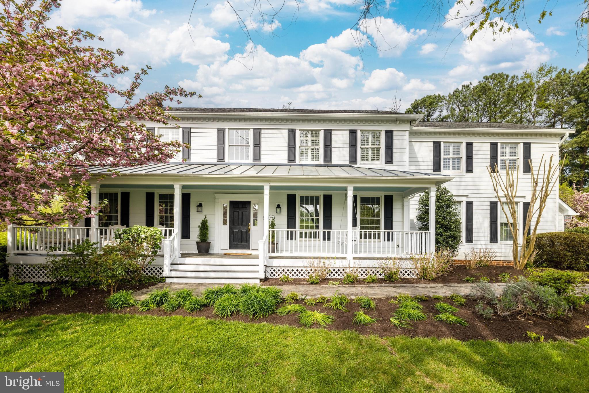 Beautiful southern style colonial with lovely front porch handsomely sited on a beautiful lot with a large flat backyard * Enter the gracious foyer that is flanked by the living and dining rooms and open into the light filled  great room with walls of windows and glass doors to deck offering great views * Newer top of the line gourmet kitchen with spacious breakfast nook * Den tucked off family room with great backyard views and glass door to deck * The main level is complete with a powder room and mudroom * The upper level features a large master suite with two walk-in closets and luxury bath as well as three secondary bedrooms with one ensuite * All upper level bedroom windows have plantation * The lower level has a bedroom and full bath as well as a den, exercise room and large recreation room * See document section for recent capital improvements and floor plans