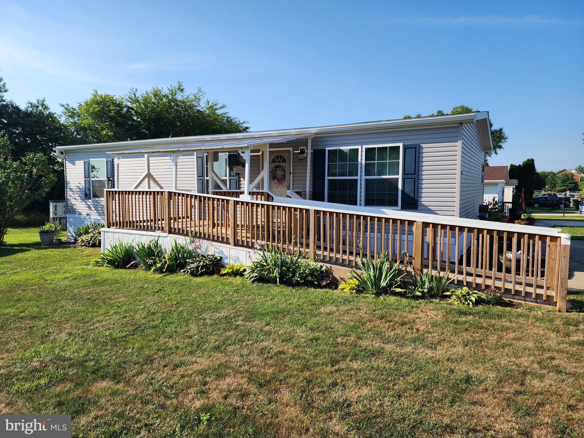 🏡 2024 Double‑Wide Manufactured Home – Spacious, Modern & Move‑In Ready
Hagerstown, MD – Larger Rented Lot 75 X 100 Near Hagerstown Airport & I‑81

WOW!!! NEW OFFER PRICE!!!  MOVE IN READY!!!  Step into comfort, convenience, and modern one‑level living in this 2024 (48' x 26' 8") double‑wide home located on a larger rented lot with mountain and farm‑field views. This 2 year old home is in very good condition and offers an open, layout with thoughtful accessibility features throughout.
Property Highlights include, 3 Bedrooms, 2 Full Baths, Primary bath with step‑in shower, Hall bath with tub/shower combo, Open Floor Plan, Bright living room flows into a spacious kitchen, Large center island with 2‑seat breakfast bar, Generous counter space, abundant cabinetry, and a cabinet pantry, Double sink and appliance package: refrigerator, stove/oven, built‑in microwave. Interior Features include
Attractive vinyl plank–look flooring with carpeted bedrooms, All window treatments convey, Large laundry room with washer/dryer, cabinet storage, and a secondary entry/exit door, Laundry room also houses the furnace, sprinkler system, and hot water storage, ♿ Accessibility & Outdoor Features
Front entrance ramp leading to a covered front porch/deck, with mountain and farmland views, Two‑car concrete parking pad and storage shed. Full Skirting around the bottom of the Home. Minutes to Hagerstown Airport, Quick access to I‑81 and the MD/PA state line. Convenient to shopping, dining, and commuter routes. Purchase is contingent on park approval. Lot Rent is $515 monthly plus utilities. See Home Floor Plan in MLS Docs