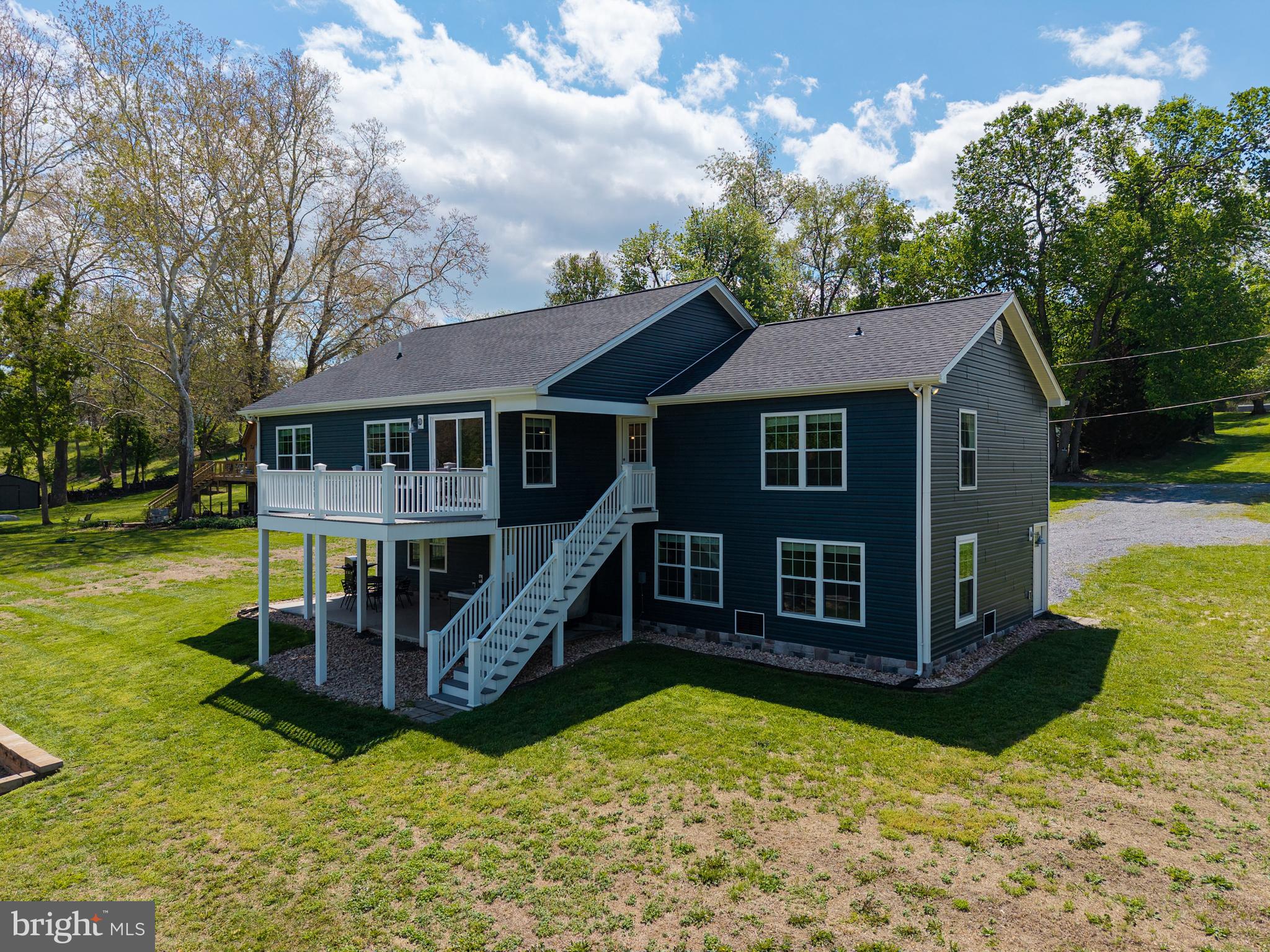 Discover the perfect blend of relaxation and investment potential with this beautifully renovated riverfront home. Updated in 2022, the property features luxury vinyl plank flooring, soaring cathedral ceilings with tongue-and-groove wood detailing, and a bright, open main living space designed to impress.
The kitchen and bathrooms are finished with sleek granite countertops, and the home includes a stylish tiled shower along with a spacious rec room—ideal for entertaining guests or maximizing rental appeal. Expansive river views create a peaceful backdrop throughout the home. Step outside to unwind in the covered patio’s hot tub or gather around the fire pit with a glass of wine as you take in the serene surroundings. Whether you're seeking a private getaway or a high-performing short-term rental, this property delivers on every level.

For more details and availability, view the Airbnb listing here: https://www.airbnb.com/l/dSOinhOR