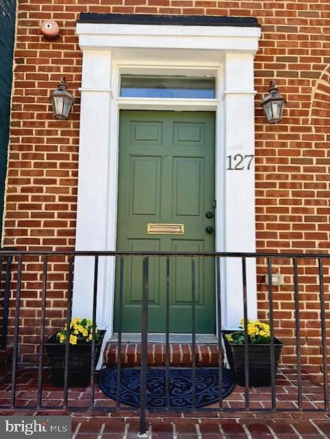127 S. Market Street presents an amazing opportunity to own a fully renovated residence in the heart of historic downtown Frederick.  Expertly updated in 2024, this exceptional property blends classic architectural character with modern systems and refined living spaces, all within walking distance of Carroll Creek and Frederick’s vibrant downtown district.

RECENTLY APPROVED FOR BUYER'S FINANCING NEEDS, 127 S. Market Street is ideally situated along one of the “Most Beautiful Main Streets in America,” as recognized by Reader’s Digest in 2025, placing you within walking distance of downtown Frederick’s celebrated restaurants, shops, and local attractions.

The home offers four bedrooms, four full bathrooms, and two half bathrooms across multiple levels of living space. Interior features include two gas fireplaces, a finished lower level well suited for recreation, guests, or additional living space, and a fourth-floor flex area ideal for a private office, studio, or retreat.

A comprehensive interior renovation completed in 2024 included updated bathrooms, new carpeting, a new refrigerator and dishwasher, and new blinds installed throughout the home in May 2024.

Significant system improvements provide added peace of mind for the next owner, including a TRANE air conditioning system installed in July 2025 with a transferable four-year warranty and a new hot water heater installed in October 2024. Additional updates include a new garbage disposal (January 2025) and a new LG dryer installed in February 2026, with professional dryer vent cleaning.

The property also offers two covered parking spaces, a valuable amenity rarely found in downtown Frederick properties.

Situated approximately 0.2 miles from Carroll Creek Linear Park, the home provides convenient access to  locally owned boutiques, art galleries, breweries, and year-round festivals. 

Downtown Frederick is known for its beautifully preserved historic streetscapes combined with a vibrant and active community, making it one of Maryland’s most desirable walkable downtown districts.

Properties offering this combination of extensive renovations, multiple levels of living space, covered parking, and a premier downtown Frederick location are seldom available and 127 S. Market Street presents a wonderful opportunity to enjoy all that downtown Frederick has to offer.

Make an appointment to see this beauty today!