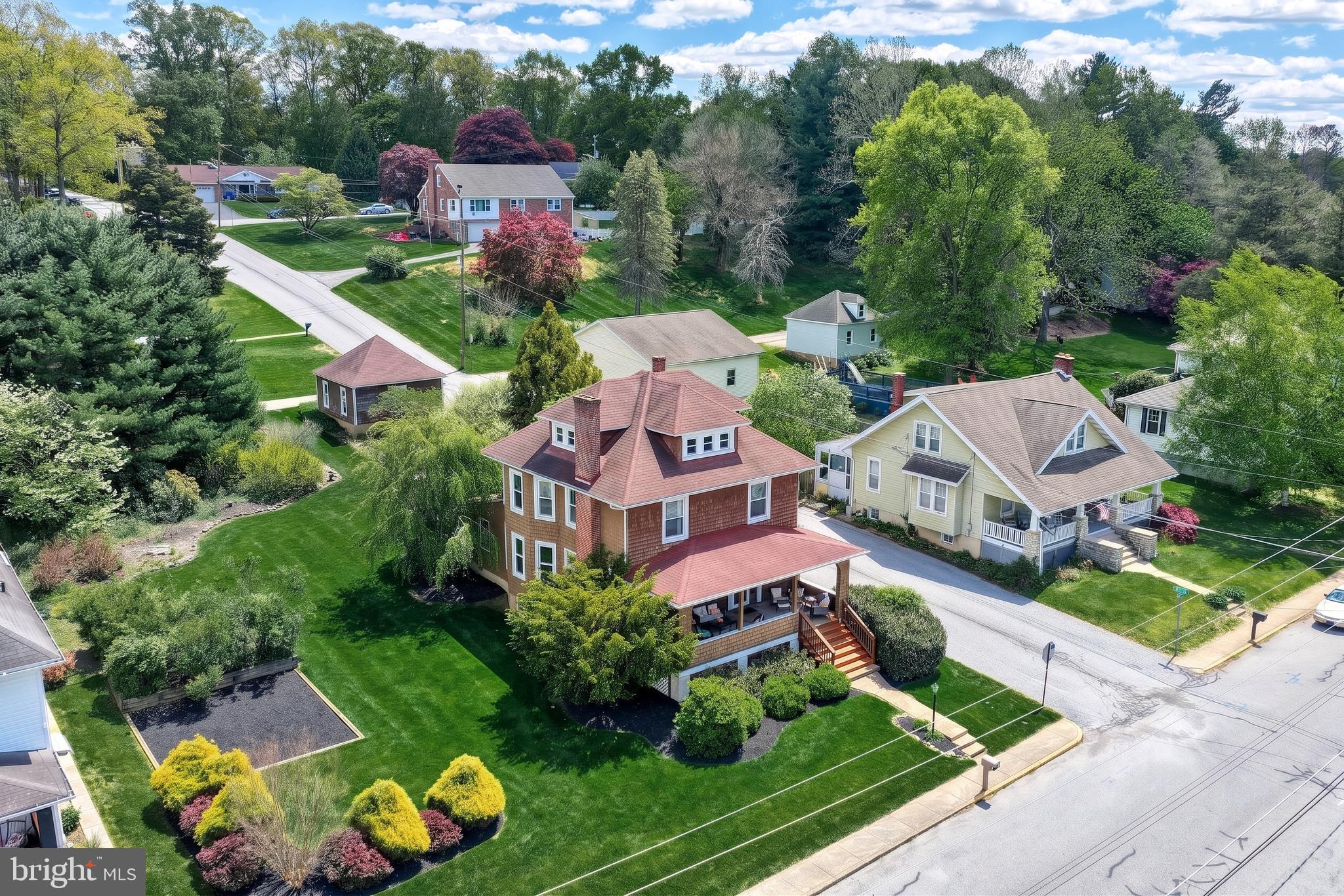 A RARE opportunity presents itself with this Stunning "One of a Kind" Home in the Boro of New Freedom!!!  Situated on a LARGE Double Lot close to the Maryland State Line you are going to absolutely FALL IN LOVE with all that this property has to offer!!!  There is No Shortage of Curb Appeal with this property, it literally stands out becoming THE Focal Point of the Block :)  From the enclosed Front Porch to the Gorgeous Landscape this home belongs in a Magazine!!!  If you ENJOY the craftsmanship that these old homes bring then this is Definitely the one for you!!! Cozy Country Style "Island Kitchen" with plenty of built in cabinits will allow you all the features one would expect with a kitchen such as this.  The addition off the back of the home currently being used as a family area could also be easily converted to an in law suite with its very own full bath.  Even upstairs in the bedrooms you will continue to find endless charm with the features each room boasts!  From the many windows in the primary to the enclosed back deck in another you will find plenty of possibilities with the way each room is set up.  The 3rd floor can also be easily used as a 5th bedroom or work area and with the panoramic views of the 3 windows you will be able to view the entire block from this vantage point!  The basement can also be used for many different possibilities depending on your needs!  The MAJOR highlight though is the MASSIVE lot this home sits on!  Mature Landscape, detached 1 car garage and LOADED with enchantment, this will have you more than excited to say the least!  They just dont make them like this anymore, making this one a MUST SEE!  Schedule your private tour today!!!