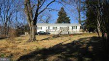 Single wide mobile (not sure of the age) on 1.74 acres. One bedroom, one bath. Does need some TLC.