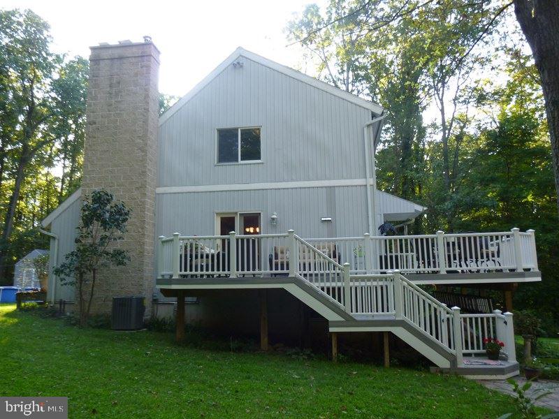 Country living at it's finest! Lovely Contemporary surrounded by a wooded area 2.8 acres. Secluded but only 10 minutes to I-83. Huge Living Room/Great Room with a wood fireplace, skylights and vaulted ceiling. one bedroom, bath & laundry on 1st floor. New furnace & CAC. Large detached, oversized 2-car garage (24x24) w/electric & a heated second floor workshop, shed. Shopping nearby. The pool has been removed, Radon system recently installed