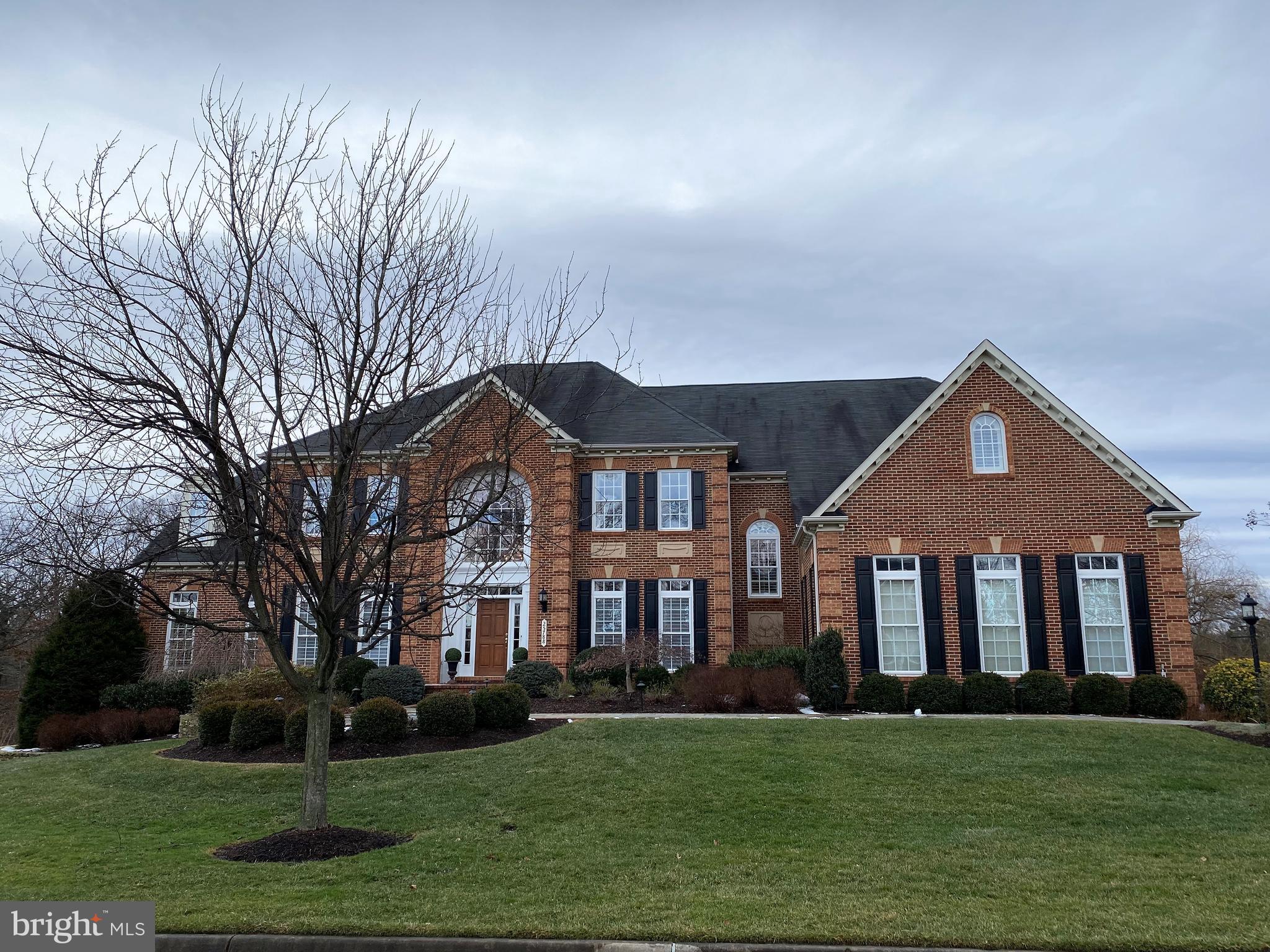 Stunning light filled NV Mount Vernon model with 8 bedrooms, 6.5 bathrooms, 2 home offices, 3 car side-loading garage with charging station located in the sought after Cedar Hunt subdivision. This amazing home has 9’+ ceilings on all levels.  This Center Hall Colonial has a grand two story foyer, double staircase, back stairs to upper level, formal living & dining room, loads of custom wood decorative moldings, hardwood floors, side sun room with private deck and stairs to lush yard, library, family room with double sided gas fireplace that passes through to the beautiful chef’s kitchen granite, island, and upscale stainless steel appliances, eat in kitchen space and a cozy informal breakfast room that could also work as a second family room. The kitchen walks out to a massive maintenance free deck with lighting, stairs to grassy yard backing to open area and trees, and a huge, screened porch with ceiling fan and outdoor TV. With 6 spacious bedrooms & 5 full bathrooms on the upper level, including a huge primary bedroom with coffered ceilings, sitting room, walk-in closets, and an amazing spa-like Tuscan luxury bathroom with soaking tub, walk-in shower, double vanities, and custom tilework. Three additional "junior suites" with private bathrooms + 2 more additional bedrooms, each with walk in closets, sharing a well-appointed jack and jill bath. The finished walk out lower level has a large recreation room with granite topped wet bar, full size refrigerator, sink, dishwasher and beautiful wood cabinetry, spacious media room, 7th legal bedroom with walk-in closet and full bath, second bedroom that would make a great home office, and plenty of storage space. This amazing professionally landscaped lot is .64 acres has irrigation, lighting, sides & backs to acres of parkland that won't be developed.
