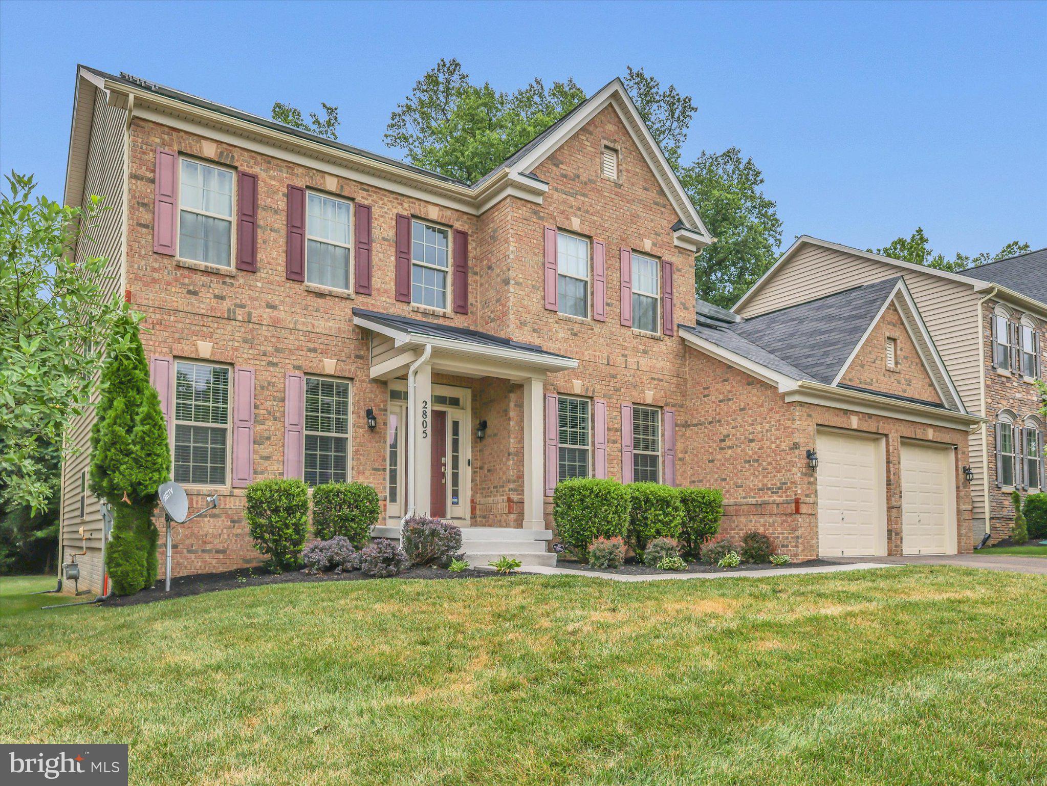 Welcome to this exceptional Colonial-style residence in the highly sought-after Woodmore Towne Centre community. From the moment you step into the dramatic two-story foyer with soaring 30-foot ceilings, you’ll appreciate the elegance, space, and thoughtful design that define this stunning home.
Filled with natural light from oversized windows, the open-concept floor plan offers the perfect blend of everyday comfort and sophisticated entertaining. The main level features extensive hardwood flooring, a formal dining room, a spacious great room with a cozy fireplace, and a gourmet kitchen designed for gathering. Enjoy a large center island with bar seating, granite countertops, stainless steel appliances, abundant cabinetry, and a bright breakfast and sunroom area overlooking peaceful wooded views.
Upstairs, you’ll find four generously sized bedrooms, each offering ample closet space and custom organization systems. The luxurious primary suite serves as a private retreat, featuring a spa-inspired bath with a soaking tub, oversized shower, double vanities, and expansive walk-in closets. A conveniently located upper-level laundry room adds everyday ease.
The finished lower level offers exceptional flexibility with a large recreation area, a private room with a full bath, abundant storage, and endless possibilities for entertaining, guests, or multi-generational living.
Outdoor living is equally impressive, with a deck and paved patio overlooking a tree-lined backyard perfect for relaxing or hosting family and friends. Additional highlights include custom blinds (some motorized), dual-zone HVAC systems, solar panels for energy efficiency, a two-car garage, and an extended driveway providing ample parking.
Residents enjoy access to outstanding community amenities, including a clubhouse, outdoor pool, fitness center, tennis courts, basketball courts, and playgrounds.
Ideally located less than a mile from Woodmore Towne Centre’s extensive shopping, dining, and entertainment options, this home also offers convenient access to Routes 50, 202, 704, I-495, Washington, D.C., Joint Base Andrews, and Northwest Stadium.
This remarkable home combines luxury, comfort, convenience, and community in one of Prince George’s County’s most desirable neighborhoods.