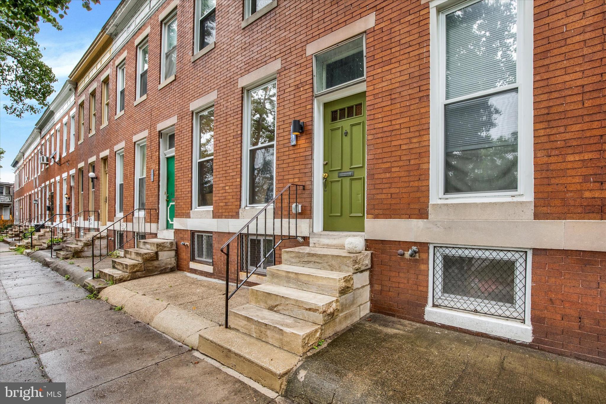 Charming and truly one-of-a-kind Charles Village rowhome, thoughtfully reimagined in 2019 into a home full of warmth, creativity, and character. This is not your typical renovation—every space reflects the vision and care of owners who created a distinctive home while honoring its historic charm. The main level was opened to create a bright, airy floor plan filled with natural light, complemented by beautifully preserved original hardwood floors. The custom kitchen features distinctive concrete countertops, blending modern design with warmth and functionality.

Upstairs, the third bedroom was reimagined as a welcoming second-floor den, offering flexible living space that can easily serve as a home office, reading room, or be converted back to a bedroom if desired.

Step outside to the inviting rear porch, the perfect place to enjoy your morning coffee or unwind at the end of the day. The backyard offers established gardening beds, creating a peaceful urban retreat.

Major improvements completed during the renovation include complete tear-off roof with a new skylight, and a high-efficiency boiler, providing both comfort and peace of mind for years to come.