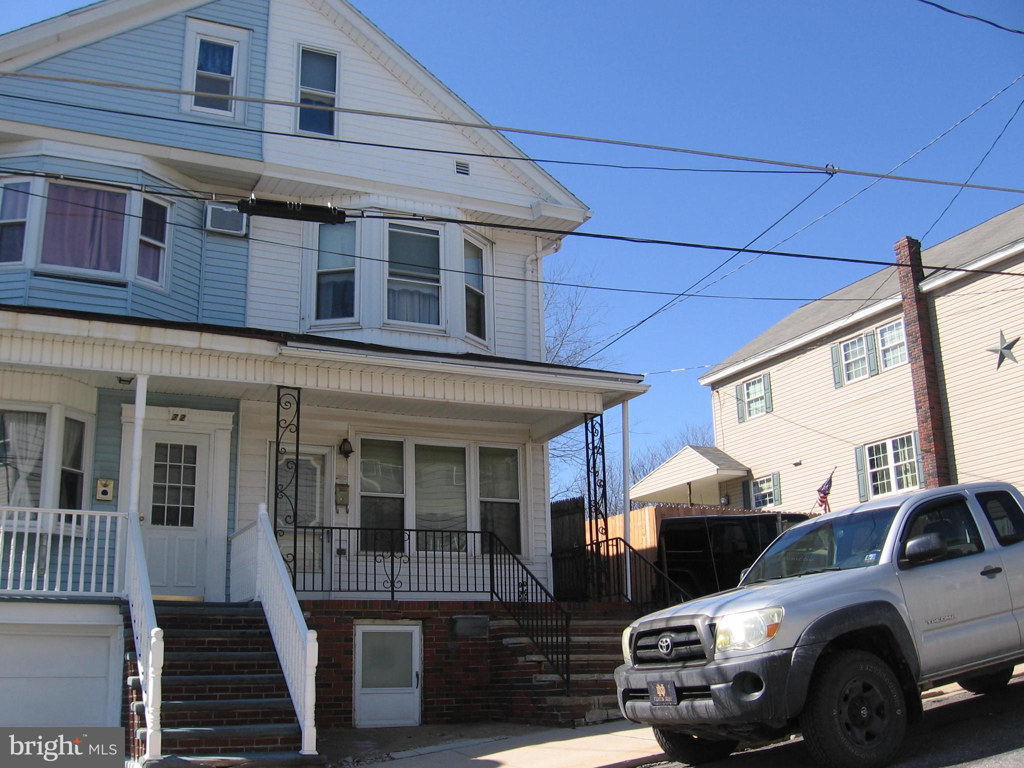 Semi-detached Home with great curb appeal . Home is in need of TLC . Great potential at this price.3Bdrms/2nd floor Bath. Fenced in backyard with entryway along side of home.