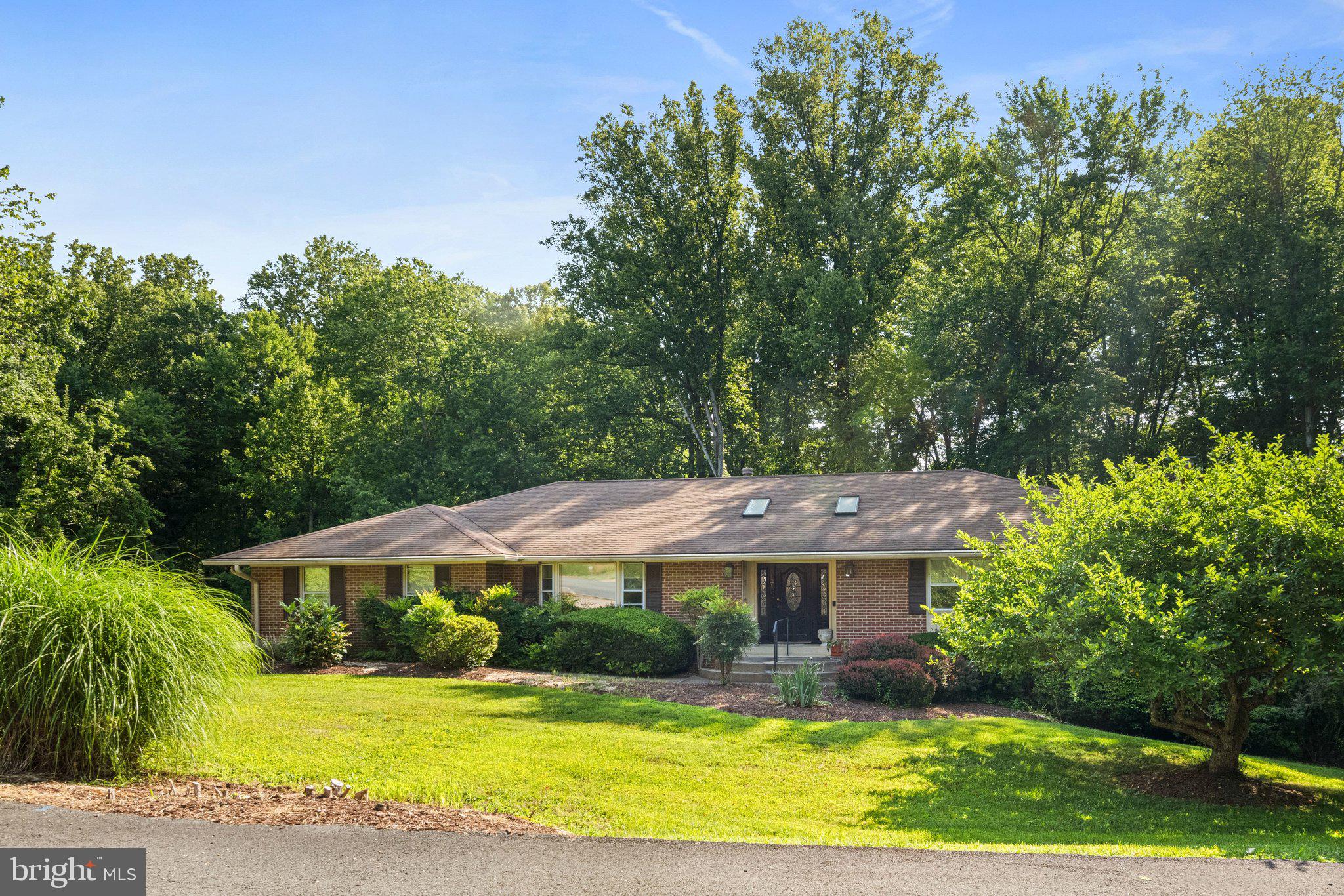 Embrace the potential of this 3 bed, 3.5 bath Oakton residence nestled in a sprawling beautifully landscaped, 1.5 acre lot. Though this house requires updates, it offers the perfect canvas to bring your design ideas to life and transform this home into your ultimate dream home. This Oakton retreat is a rare opportunity to secure significant acreage in a premier northern Virginia neighborhood. It is situated in the highly sought-after Oakton/Vienna area providing unparalleled privacy while keeping you minutes away from major commuter routes (I-66, Route 123). This home features a coveted main-level primary suite and laundry room. The tranquil sunroom offers the ultimate space to enjoy your coffee or unwind year-round bringing the beauty of the outdoors inside. The lower level offers an ideal set up for multi-generational living or a private retreat, complete with a large bedroom and full bath. A versatile extra room provides the perfect work-from-home office, hobby room or guest space. The cozy fireplace adds warmth and ambiance to the main recreation area, while a large, dedicated storage room easily accommodates your organizational needs. This home is located within the highly desired Oakton High School Pyramid.