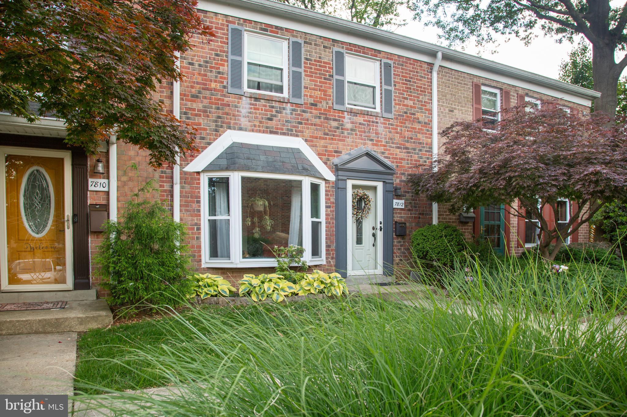 Nestled in the heart of historic Greenbelt, this beautifully maintained and move-in ready two-level townhome blends timeless charm with modern updates. Featuring hardwood floors throughout, 3 bedrooms, 1 full bath and 2 half baths, this inviting home offers comfort, style and one of the community’s most desirable outdoor settings.

One of only 24 homes in the community with the rare bonus of a serene backyard retreat, the outdoor space is a gardener’s delight. Enjoy relaxing or entertaining on the extended patio (2017), surrounded by mature landscaping that includes lavender, rosemary, peonies, hydrangeas, irises, roses, hostas and mountain laurel. The HOA-approved backyard fence (2017) may remain or be removed - buyer’s choice.

Step inside to freshly painted interiors thoughtfully selected to complement the rich hardwood flooring. The sun-filled dining room was enhanced in 2021 with elegant molding, a decorative medallion, and chandelier, with additional insulation added in 2024/2025 for comfort and efficiency. The renovated main-level powder room (2019) adds convenience and style.

The updated kitchen (2018) features stainless steel appliances, granite countertops, white cabinetry and a modern glass tile backsplash. A thoughtfully designed pass-through opens the kitchen to the dining area, creating a bright and airy flow ideal for everyday living and entertaining. A new bottom-freezer refrigerator was added in March 2026. The spacious living room continues the home’s appeal with refinished hardwood floors, updated sliding glass doors (2022) and inset dimmable ceiling lighting (2025) creating a warm and welcoming atmosphere.

Upstairs, the generously sized primary suite is filled with soft morning light and features two closets and a private half bath. Flooring and windows were updated in 2017. Two additional bedrooms showcase original parquet flooring, beautifully refinished in 2022, and receive wonderful afternoon sunlight through updated windows installed in 2022. These versatile rooms are perfect for bedrooms, guest rooms or home office space. The fully renovated hall bath (December 2023) offers stylish finishes, including elegant tile flooring, a new vanity and mirror, updated fixtures and a tub surround featuring antimicrobial-resistant tile.

Ideally located, this home offers exceptional access to the best of Greenbelt living, including nearby tennis courts, scenic Buddy Attick Park, Greenbelt Lake and the charm of historic Greenbelt. Outdoor enthusiasts will appreciate the close proximity to Greenbelt Park with its hiking trails and campground. Convenient commuter access to I-495 and the BW Parkway places major employers and destinations nearby, including the University of Maryland, NASA Goddard Space Flight Center and Luminis Health Doctors Community Medical Center, along with abundant shopping and dining options.

Welcome home to the perfect blend of character, comfort and convenience in Greenbelt.