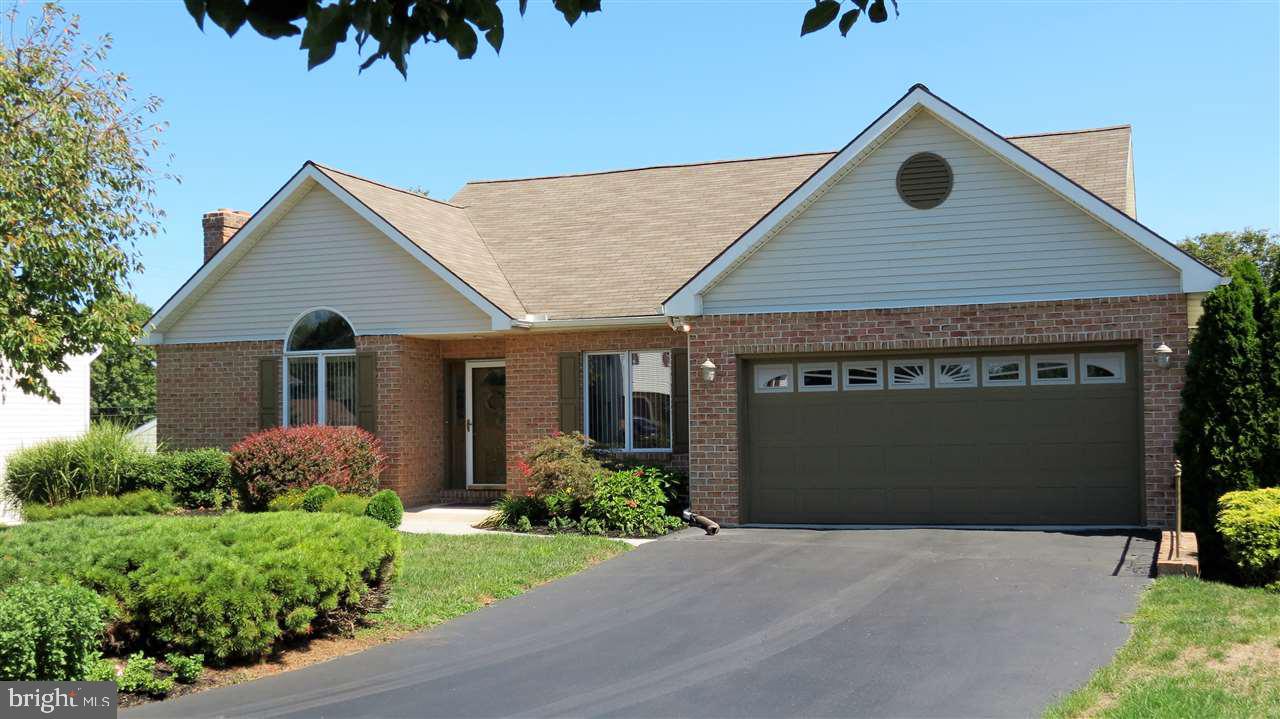 Wonderfully cared for brick rancher w/ open floor plan, vaulted ceilings & lots of natural light! Master bedroom w/ full bath and his and her closets, large living room with fireplace, cozy den, huge family room, 4th bedroom in lower level with additional full bath, 2 car garage, rear deck w/ stairs to patio and nice yard tucked away on quiet cul-de-sac just minutes away from anything you need! All appliances convey & this home is move in ready!