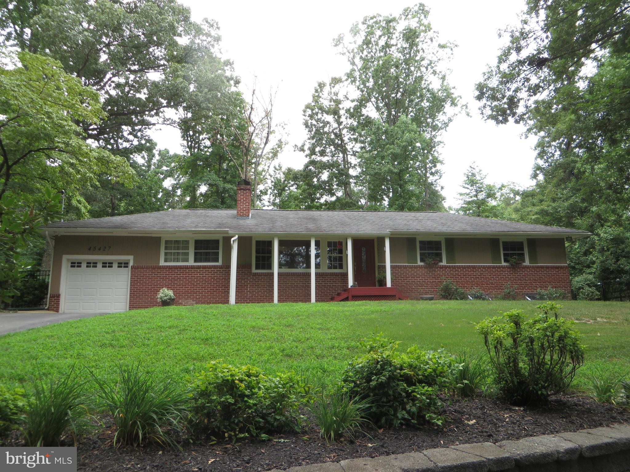 Upgrades & improvements galore! Remodeled KT & baths, new KT appl's & granite counter w/brkfst bar, built-ins, new doors, patio & pergola! Refin hdwd floors in LR/DR/BRs, ceramic tile in KT & baths. Den/4th BR & office--nice extras! Windows & HVAC replaced, xtra attic insulation & ridge vent added. Full bsmt has R/I plumbing, some framing, waterproofing system. Fenced yard, 1.3 acre, garage, MORE!