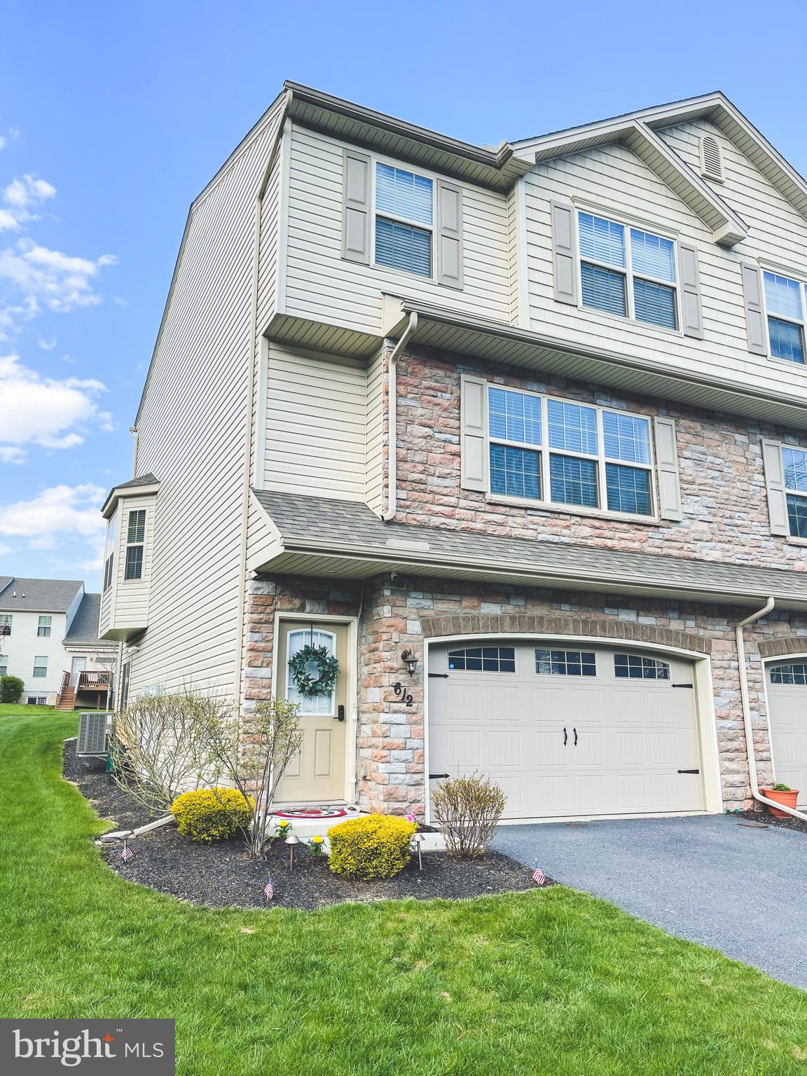 Welcome to Dorset Square in the desirable Winding Hills Community!  Absolutely stunning end unit that shows like a model home.  Extremely well maintained and so beautifully  updated throughout you will fall in love.   The heart of the home features a large,  light and bright living room that flows  right into that gorgeous  kitchen  perfect for entertaining !  Not only is there a  large center island with seating, there is a perfect spot by the bay windows for your favorite dining  table.  Expand outdoors when the weather is right on the fantastic deck   that overlooks  beautiful  green space & sidewalks  that YOU don't have to maintain!   Upstairs features a master suite with  walk in closet & full bathroom with double sinks,  two more nicely sized  bedrooms , another full bath and convenient laundry area WITH the washer and dryer in place!  No carrying laundry up & down stairs!   There is  even more space to spread out in the lower level  bonus room that could be used as a second living room, home gym,   rec room, office,  4th bedroom, playroom...whatever YOU want!  There is SO much to love about this home and this spectacular neighborhood that has  walking/biking paths, a community center, a fitness center, and a HUGE outdoor pool  just steps away.   You will most certainly want to call this HOME!