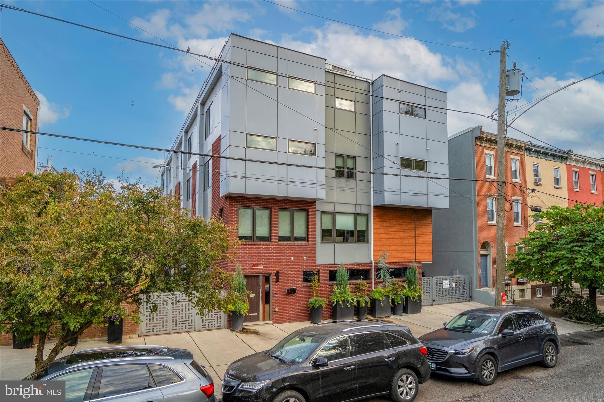 Approximately 7 years remaining on the tax abatement. Don't overlook this exquisite 3-bed, 5-bath (3 full, 2 half) residence nestled in the heart of Fairmount! This exceptional home stands out in a league of its own, boasting an array of premium features.

No expense was spared in elevating this home to the pinnacle of luxury. As you enter the foyer adorned with exquisite hardwood floors and decorative marble accents that extend throughout the house, you'll find a convenient powder room and access to the garage. From here, you can either descend into the finished basement, complete with heated floors, or ascend to the main living area.

The main floor offers a seamless flow from the living room, dining room, and kitchen. The kitchen is a chef's dream, equipped with top-of-the-line stainless steel appliances, a dual-oven, cooktop, ample cabinetry, and elegant marble countertops.

On the third floor, you'll discover two generously-sized bedrooms, each with its own ensuite bathroom and multiple walk-in closets. A well-appointed laundry room completes this level.

The fourth and final floor houses the expansive primary bedroom, featuring two walk-in closets and large windows that bathe the room in natural light. The ensuite bathroom is a haven of luxury, showcasing a standing glass shower, dual vanity, and a modern soaking tub. Above the primary bedroom, you'll find an expansive roof deck with breathtaking views of Center City. The deck includes an owner-upgraded outdoor kitchen and garden, making it the ideal outdoor setting for hosting guests on beautiful summer days.

This location is exceptionally convenient, just minutes away from essential amenities, including public transit, Whole Foods, an array of restaurants, cafes, and more. Opportunities like this are rare and in high demand, so don't delay. Contact us today to schedule a showing of this exceptional property!