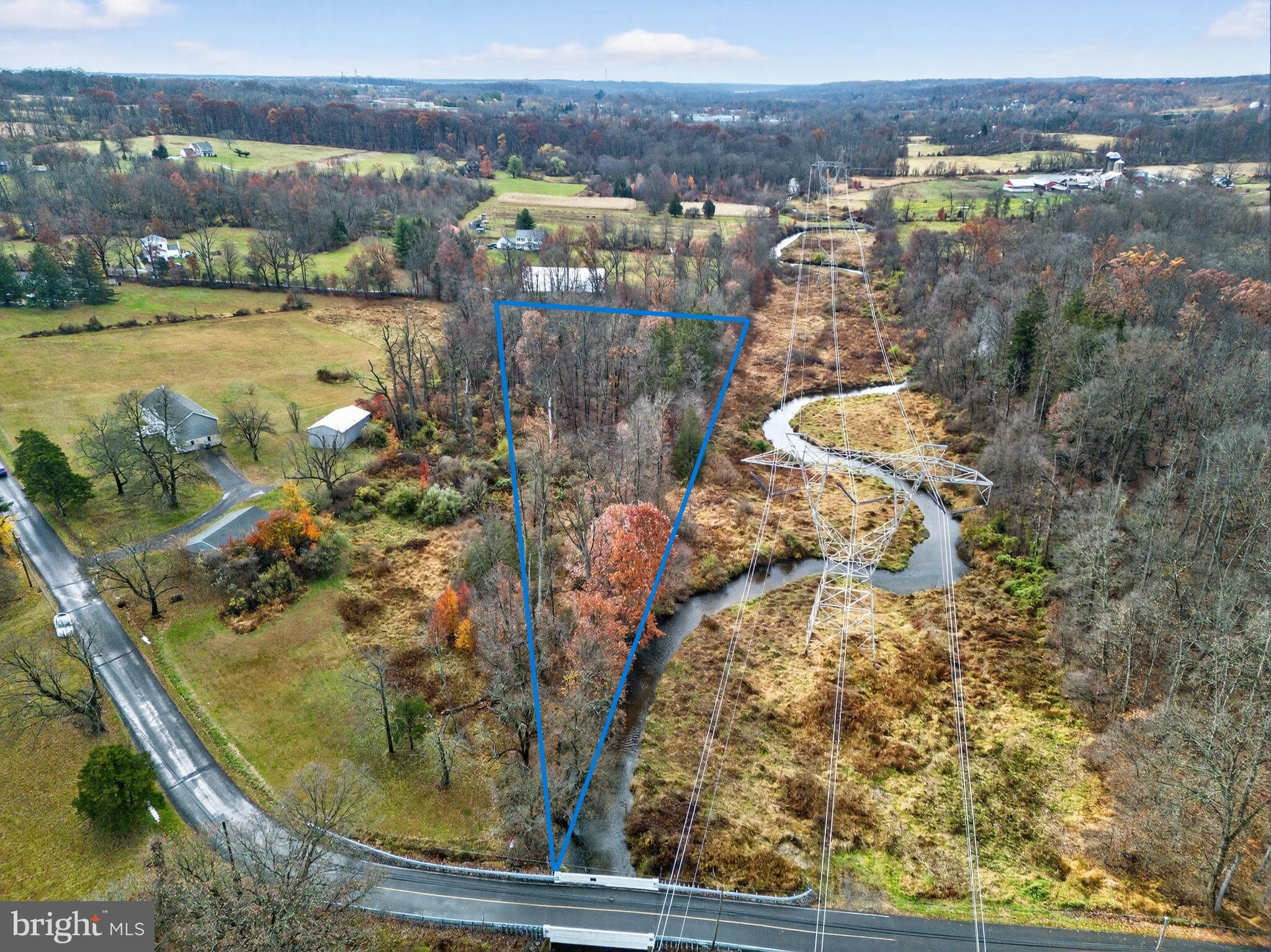 1.16 Acres of Vacant Land Surrounded by Preserved Property

Opportunity awaits on this 1.16-acre wooded parcel ideally situated between two preserved properties. The location offers a unique setting for outdoor enthusiasts and hunters alike. The land is heavily wooded yet accessible by foot, featuring a natural creek that runs along the edge of the property. An open powerline pathway provides clear visibility and a natural travel route for wildlife. This parcel offers the perfect opportunity to set up a hunting stand and enjoy the privacy of being surrounded by nature, while remaining conveniently close to home.