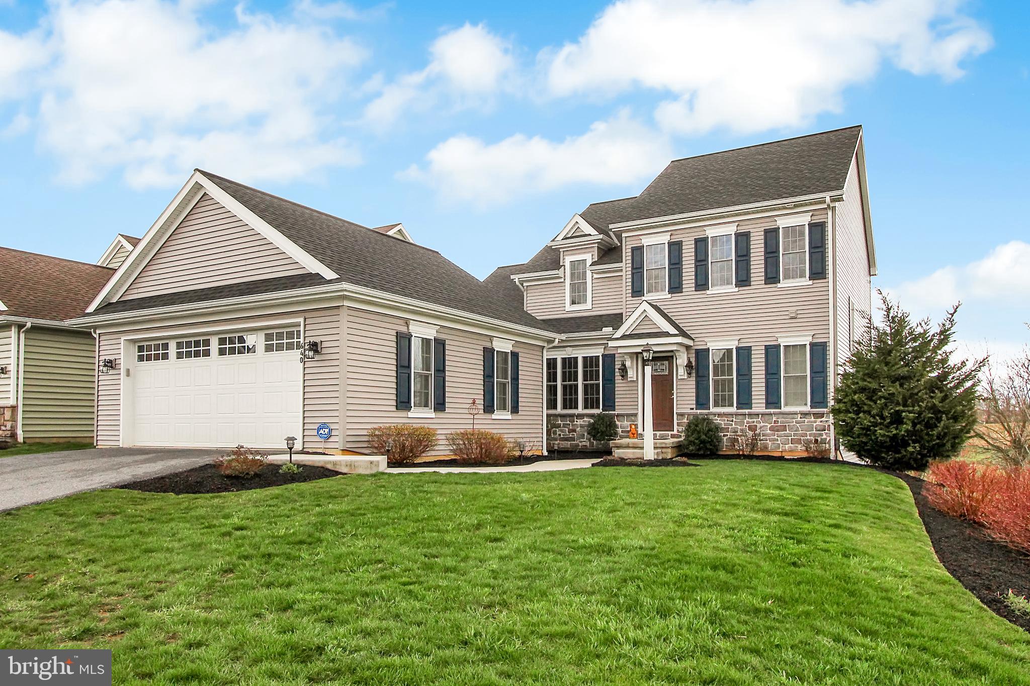 You'll love the scenic views from the deck and patio of this like-new former Parade home in Wetherburn Commons. You'll appreciate the attention to detail throughout, including crown molding, hardwood floors and granite counters in the designer kitchen and in all bathrooms. Spread out in the generous loft and walk-out finished basement. Enjoy the fitness trail and neighborhood shopping and dining.