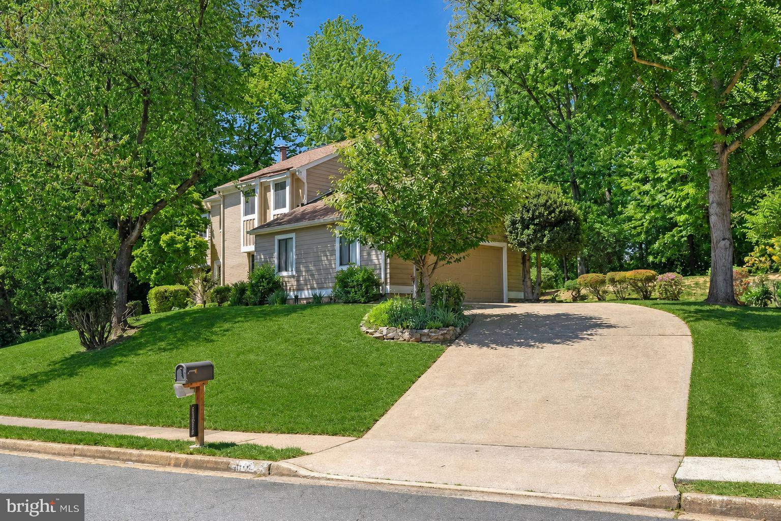Welcome to this beautifully updated Reston home, offering timeless design and a well-balanced mix of open and defined living spaces. The main level features a bright living room, formal dining room, and a comfortable family room with a fireplace, all enhanced by large windows that bring in natural light throughout the day.
Take a virtual tour of the home through the 3D Matterport scan accessible from the video icon above the photos. 
The updated kitchen features granite countertops and quality finishes. A separate eat-in area provides space for casual dining and everyday living. A sliding glass door off the living room opens to the patio, creating a seamless connection to outdoor space.

Upstairs, you’ll find four spacious bedrooms and three full bathrooms, including a standout primary suite with two bathrooms and dual walk-in closet areas, offering a level of space and flexibility that’s hard to find.

The spacious lower level offers a versatile recreation area featuring a full wall of custom built-ins, creating an ideal library-style setting for relaxing or working from home.

Recent updates include fresh paint, new carpeting, updated light fixtures, and luxury vinyl plank flooring on the main and lower levels. Additional features include Hardie Plank siding and a thoughtfully designed layout that balances comfort and functionality.

The home is complete with an oversized, side-load two-car attached garage with ample storage space, along with an extended driveway and additional off-street parking.

Ideally located, this home offers convenient access to Reston’s extensive network of walking trails and separately, its connected biking paths. Community pool facilities are located less than 0.5 mile away. Golfers will enjoy local courses including Reston National Golf Course only a 7 minute drive. Enjoy close proximity to shopping, dining, and entertainment at Reston Town Center within 12 minutes, and Tysons Corner Center only 20 minutes from home. This home is situated in the heart of Reston with easy access to major commuter routes.