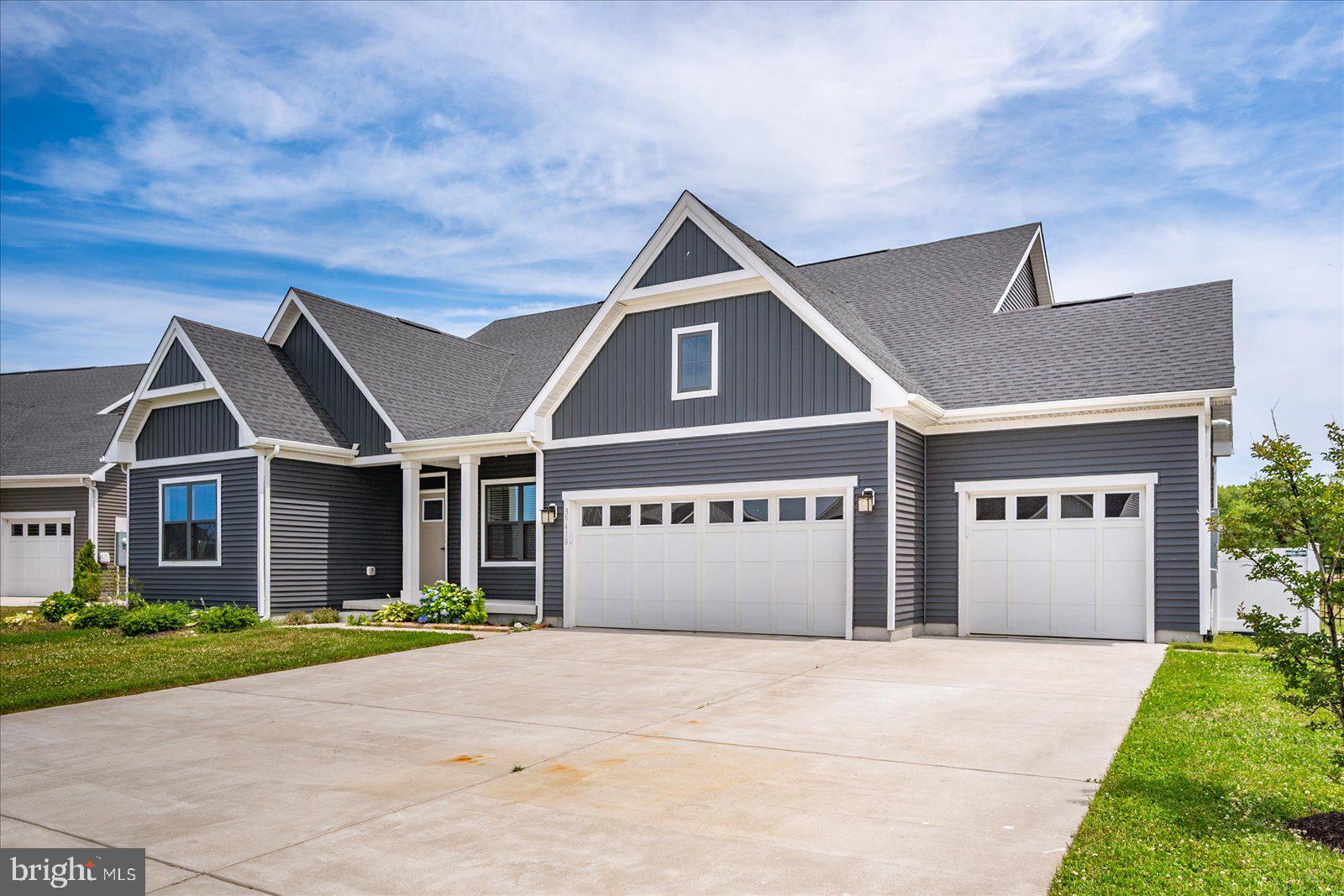 Welcome to one of the most versatile homes in Selbyville offering space, flexibility, and a rare three-car garage in a sought-after community with a clubhouse and pool.
Step inside to a formal sitting area that sets the tone, then flow into a large open-concept layout where the kitchen, dining, and living spaces all connect seamlessly. The kitchen is designed for both everyday living and entertaining, with plenty of room to gather without feeling crowded. First-floor laundry keeps everything convenient, and true one-level living is possible with three bedrooms and two full bathrooms all on the main floor.
Upstairs opens up even more opportunity. You’ll find a spacious common area, an additional bedroom and full bathroom, plus an unfinished room that can easily be converted into a fifth bedroom, office, or flex space, giving you room to grow or customize to your needs.
Outside, enjoy a screened-in covered patio overlooking a fully fenced backyard, perfect for relaxing, entertaining, or letting pets run freely.
Between the layout, the square footage, and the rare garage space, this home checks boxes that are hard to find in this area