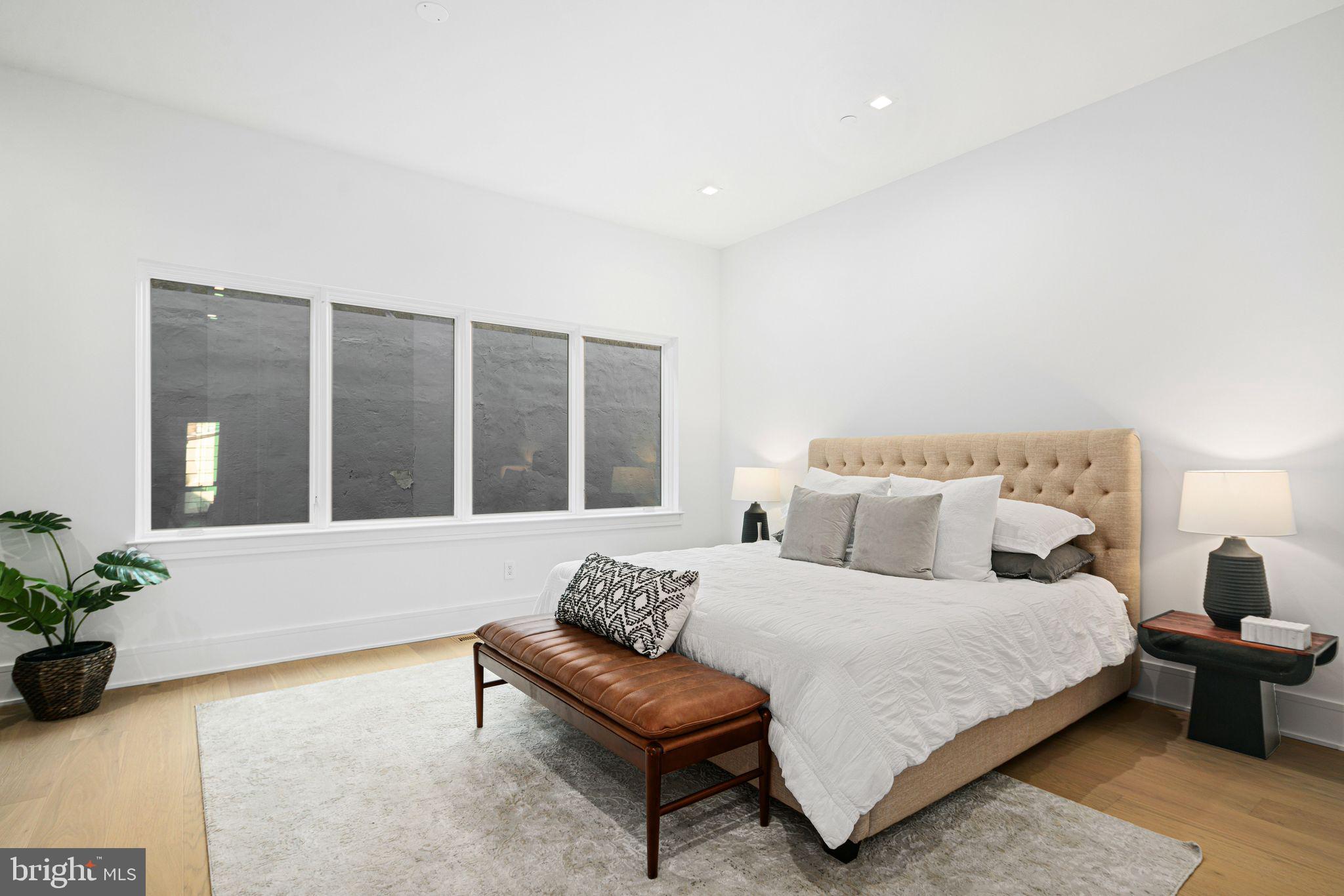 Introducing Cypress Commons: An exceptional collection of 9 new construction luxury townhomes in Washington Square West, with an estimated delivery 2025. Washington Square West in Philadelphia is a captivating, established neighborhood with historic charm and modern vibrancy. Its picturesque streets are lined with preserved rowhomes, creating an inviting and timeless ambiance. With its proximity to iconic landmarks, renowned dining establishments, and a strong sense of community, Washington Square West is a quintessential urban oasis that seamlessly marries the past and present. Cypress Commons nestles deep into the heart of Wash West as an exclusive townhome enclave on a charming street. These homes span an impressive 4,502 square feet of meticulously designed living space. The ground-floor entrance offers direct access to an attached two-car garage, which opens into a spacious foyer. The lower level boasts a full bathroom and two generously sized finished spaces, ideal for a home office, gym, or media room. It also serves as the first stop on your private elevator, adding convenience to your daily life. The second floor is a state-of-the-art chef's kitchen featuring tastefully muted cabinetry and exquisite quartzite countertops. This culinary masterpiece has an overlay Wolf/SubZero appliance package. An open-concept design connects the kitchen to the living room, a stylish dining room, and half bathroom. You can walk through double sliding glass doors from the living room to a private balcony, perfect for entertaining. The third floor is dedicated to convenience with a well-appointed laundry room complete with a folding station and laundry sink. Here, you'll also discover two generously sized bedrooms, each with its own en-suite bathroom and walk-in closets. The fourth-floor sanctuary is your primary bedroom suite, offering an oversized walk-in closet and a luxurious bathroom that sets new standards of opulence. Enjoy an oval soaking tub, marble tile, and heated floors. A seamless curb leads to a spacious railhead shower, multiple sprayers, and a handheld attachment. Enjoy rooftop serenity with a private roof deck and be captivated by a sweeping view of Philadelphia's gleaming skyline and neighboring historical landmarks. It's the perfect setting for unforgettable moments and cityscape vistas. Cypress Commons is conveniently located just a short distance from critically acclaimed restaurants and local favorites, including Vetri Cucina, Talula's Garden, Green Street Coffee Co., and Little Nonna's. Enjoy the convenience and security of smart home technology, featuring a Schlage keyless entry smart lock, Google Nest thermostat, Ring video camera doorbell, and a garage door opener - all easily managed from your smartphone. Each home has a Ten Year Real Estate Tax Abatement under Councilmanic Ordinance 1456-A, Section 19-1303.4 of the Philadelphia Code, and a one-year builder’s warranty is included with each home for added peace of mind. Don't miss your opportunity to reside in a luxury townhome at Cypress Commons, combining modern luxury with tradition in the heart of Washington Square West!