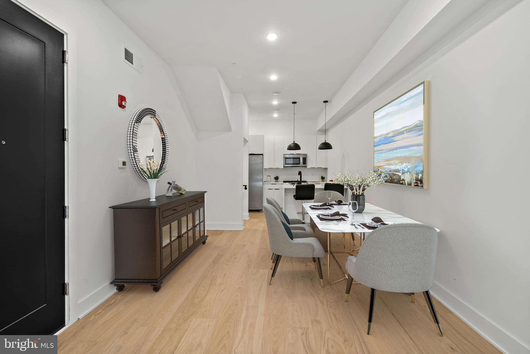 ***Seller offering a rate buy down***
Welcome to Unit A of 1613 Brown St. In the heart of Fairmount/Francisville this gorgeous 2 bedroom, 2.5 bathroom unit is a unique bi-level. Upon entering the unit, you are welcomed into the living room space. Tremendous natural light beams through the large windows on the first floor which opens into an expansive living room. Big enough for a dining table as well, this unit leaves little to be desired. Moving past the living room and dining area, is a sensational chef’s kitchen. With stainless steel appliances, an upgraded 36-inch range, quartz countertops and a large peninsula/island. The half bathroom is directly off the kitchen. As you move downstairs, you will find a bedroom, full bathrooms and washer and dryer area along side a home office desk/workspace. Both bedrooms are very large with plenty of space for king size mattresses. Both bedrooms also have walk-in closets, which can be built out. Schedule your tour now! Also, a note on the taxes, those are the taxes for the entire building without the building abatement. ***Buyer responsible for looking into 10 year tax abatement qualifications.
