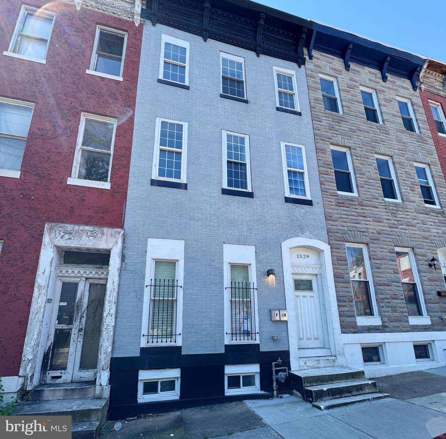Welcome to this 4-level townhouse that offers classic charm and modern convenience in the heart of Baltimore! This property presents unique opportunity with two units, each showcasing its distinctive character. You can live in one unit and have the other unit as potential rental income. The first unit features three well-appointed bedrooms, three full and half bathroom, a spacious living room and an updated kitchen with island, white shaker cabinetry, granite countertops and stainless-steel appliances. The 2nd unit offers three bedrooms, three full bathrooms with tub & stall showers, a living room and an upgraded kitchen with granite countertops and stainless-steel appliances. Both units have living spaces that are adorned with a mix of carpet, laminate plank, and ceramic tile flooring, providing both comfort and style. The partially finished basement, accessible via a connecting stairway, offers additional living space and utility. Outside, the rear yard provides a private outdoor retreat, ideal for relaxation or entertaining. Enjoy picturesque views of the adjacent Harlem Square Park, which once stood as one of the city's largest and most beautiful parks. This home is located in vibrant neighborhood that offers a wealth of cultural attractions and dining venues, making it a sought-after destination for city living. Don't miss out on this wonderful opportunity! Schedule a showing today.