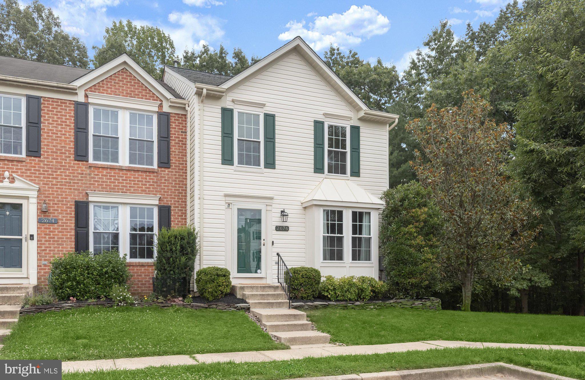 Backing to a peaceful tree lined setting in the highly desirable Piney Orchard community, this beautifully updated end unit townhome combines modern style, generous living space, and an exceptional location. Hardwood flooring, an open floor plan, and extensive interior improvements, including fresh paint completed in 2026, updated flooring, recessed lighting, a renovated kitchen, a new water heater, updated fixtures, and more, create a move in ready home designed for today's lifestyle.
Completed in 2020, the kitchen is both elegant and functional with upgraded stainless steel appliances, including a gas range, an expansive island with an apron front sink, ceiling height cabinetry with under cabinet lighting, roll out shelves, and an additional wall of cabinetry, counter space, and pantry storage that makes entertaining and everyday living effortless. Just beyond, the dining room opens through a sliding glass door to the Trex deck, where peaceful wooded views provide the perfect backdrop for morning coffee or evening relaxation.
Upstairs, two spacious bedrooms each enjoy access to a full bath. The primary suite is highlighted by a vaulted ceiling, two walk in closets, and a private bath featuring a soaking tub, separate shower, and double sink vanity. The second bedroom is served by a full bath that is also conveniently accessible from the hallway.
A comfortable family room anchors the lower level, where a cozy fireplace creates a welcoming atmosphere. A sliding glass door leads directly to the fenced backyard with a private patio, while a half bath and a laundry room with additional storage add everyday convenience.
Enhanced landscaping creates an inviting outdoor setting, while privacy fencing adds to the sense of seclusion. Two assigned parking spaces are included, with additional visitor parking conveniently located throughout the community.
Life in Piney Orchard offers far more than a beautiful home. Residents enjoy multiple outdoor pools, an indoor pool and hot tub, a fitness center, tennis and pickleball courts, playgrounds, scenic lakes, and more than 45 acres of protected nature preserve with trails for biking and leisurely strolls. A clubhouse, seasonal farmers market, nearby parks, shopping, dining, Fort Meade, and the MARC commuter train complete the appeal of this vibrant and well connected community.
