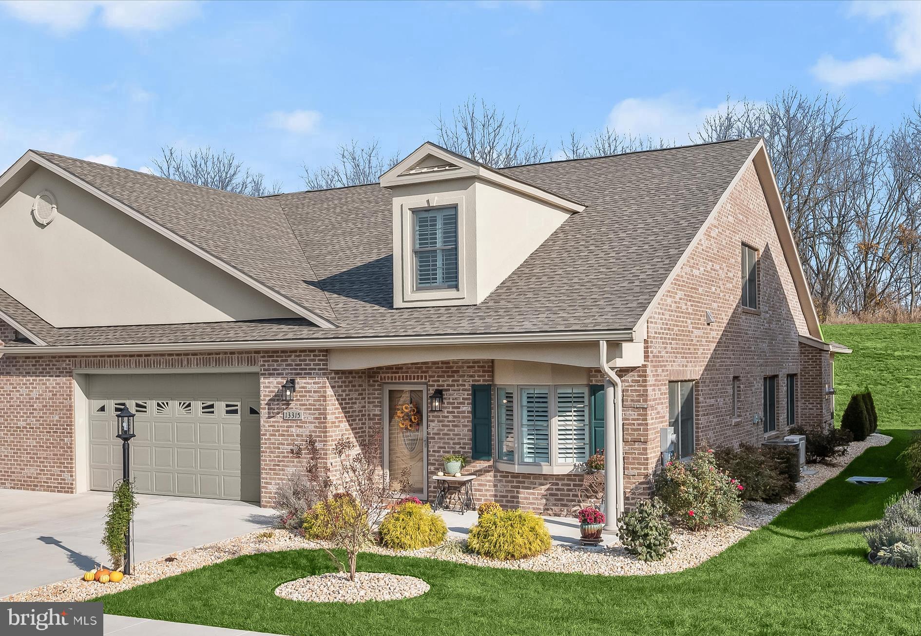 Welcome to 13315 Diamond Pointe Drive, a beautifully crafted home in the sought-after 55+ community of Emerald Pointe in North Hagerstown. This exquisite all-brick residence showcases meticulously maintained living spaces, enhanced with high-end custom updates.

Inside, you'll find timeless elegance with classic moldings, custom-fit plantation shutters, soaring 9’ ceilings, and a three-zone HVAC system. Rich luxury vinyl plank flooring and plush carpeting create a warm and inviting atmosphere.

Step into the welcoming foyer, which leads to a private office featuring built-in cabinetry and a pocket French door—perfect for remote work or personal projects. The stunning eat-in kitchen is a chef’s dream, complete with custom soft-close cabinetry, gleaming Quartz countertops, top-of-the-line stainless steel appliances, a decorative backsplash, a center island with breakfast bar, and a spacious pantry. Seamlessly flowing into the dining area, this space is ideal for entertaining.

Anchoring the extended living room is a cozy stacked-stone fireplace, with access to a screened patio—perfect for outdoor relaxation. The main-level primary suite is a peaceful retreat, featuring a spa-like en-suite bath with dual vanities, an oversized custom-tiled walk-in shower, solar tube lighting, and a spacious walk-in closet. This level also includes a second bedroom, a full bath, and a well-appointed laundry room with Quartz countertops and direct access to the garage, which boasts epoxy floors, built-ins, and granite counters.

Upstairs, the home offers a second primary suite, a versatile bonus room, and ample storage.

As part of Emerald Pointe, residents enjoy access to a vibrant clubhouse with a commercial kitchen, pool table, grand piano, game room, indoor saltwater pool, fitness classes, pickleball courts, and more! The association fee covers lawn and shrub maintenance, snow removal, trash, and recycling—ensuring a maintenance-free lifestyle.