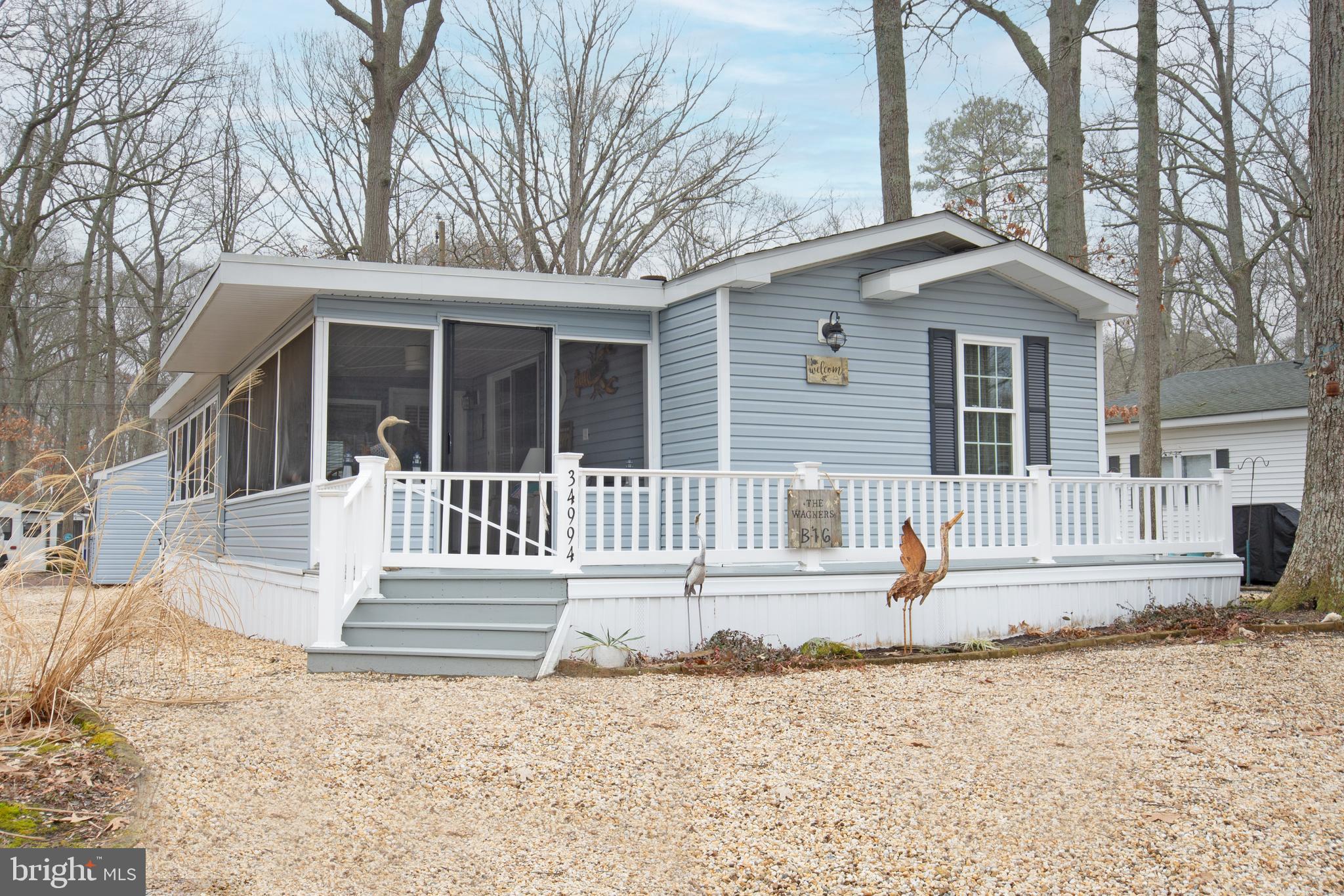 Discover your dream of affordable waterfront living in West Bay Park, a gem close to Lewes, Rehoboth Beach, and Dewey Beach. Our newly listed home offers the luxury of resort community living with marina access without the hefty price tag. This home is part of a vibrant community where scenic waterfront views and amenities of higher-priced neighborhoods come as a standard.  Our lot rent will include sewer, trash removal services and so much more!  We have a full calendar of activities and bands, BBQs and more!  We offer a fishing/crabbing pier, pool, new community center, and cafe that is open for breakfast, lunch and dinner.
