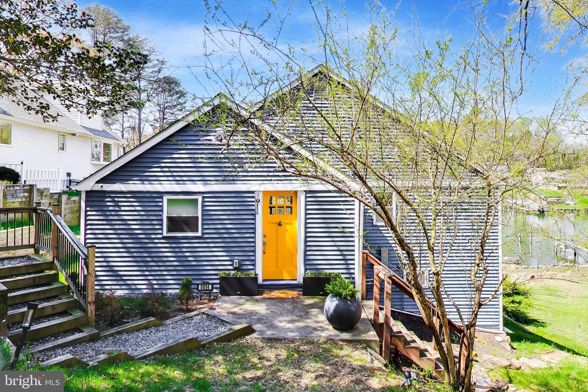 Tucked away on Mathias Cove in Forest Glen, this peaceful waterfront property offers a private retreat with views that instantly draw you in. From the moment you enter, the home’s inviting layout and thoughtful updates create a warm, welcoming feel. The renovated kitchen flows seamlessly into a spacious great room with vaulted ceilings, abundant natural light, and warm hardwood floors.

Large sliding glass doors open to an expansive covered deck overlooking the water—perfect for outdoor dining, entertaining, or simply relaxing on a summer afternoon. The functional kitchen combines timeless and modern elements, featuring stainless steel appliances and granite countertops. 

The open-concept living and dining areas offer versatility for a variety of layouts, while the covered deck easily accommodates both seating and dining spaces. The primary bedroom captures beautiful water views through a large picture window, creating a peaceful start to each day. Dual closets provide ample storage, and the attached bathroom includes a walk-in tiled shower with updated fixtures. A second bedroom and an additional full bath with stylish finishes complete the main level.

On the lower level, a comfortable family room gives you direct access to the backyard and waterfront. A utility room has been upgraded with a work sink and front-loading washer and dryer for added convenience. 

The outdoor setting truly sets this property apart, offering an exceptional waterfront lifestyle along the Chesapeake Bay. In summer 2024, the shoreline underwent a significant restoration designed with a landscape architect, incorporating hand-placed boulders to enhance both stability and aesthetics. At the same time, the pier was fully rebuilt to provide deep-water access, complete with new pilings, updated decking, and a large slip. Electricity and plumbing were added along with 100-amp service and a custom International Dock pedestal. A High Tide Jet Ski lift with dedicated power was also installed, along with three new water connections. Custom Hubbardton Forge lighting, controlled by a Lutron timer system, illuminates the pier in the evening creating the perfect vibe. Upgrades continue with a French drain system to support proper water management. 

This is a rare opportunity to own a distinctive waterfront home where the major improvements have already been completed—ready for you to move in and enjoy everything life on the water has to offer.