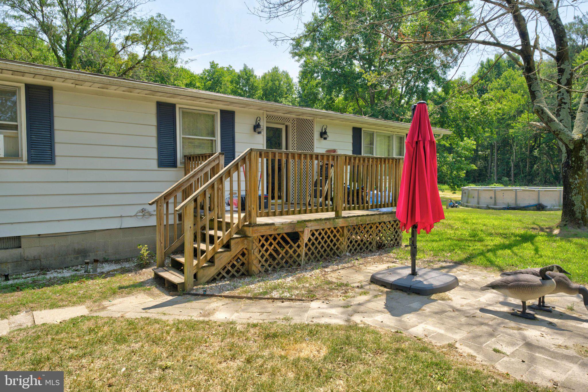 Endless possibilities await at 16897 Dupont Blvd in Georgetown! Situated on just over 2 acres along one of Sussex County's busiest corridors, this 3-bedroom, 2-bath home offers the perfect combination of comfortable living and future potential.

Inside, you'll find over 1,600 square feet of living space with a functional layout ready for your personal touch. Outside, the property features a detached garage, providing additional storage, workspace, or parking, while the roof was replaced in 2016, offering added peace of mind.

Whether you're looking for room to spread out, a property with exceptional visibility, or an investment with long-term potential, this property deserves a closer look. Its prime location along Dupont Boulevard provides outstanding exposure and may present future opportunities for buyers interested in exploring commercial or mixed-use possibilities. Buyers should conduct their own due diligence regarding zoning, land use, and any potential future development opportunities.

Conveniently located just minutes from Georgetown's shopping, restaurants, medical facilities, and Delaware's beautiful beaches, this property offers the space, location, and versatility to fit a variety of needs. Schedule your private showing today and imagine the possibilities!