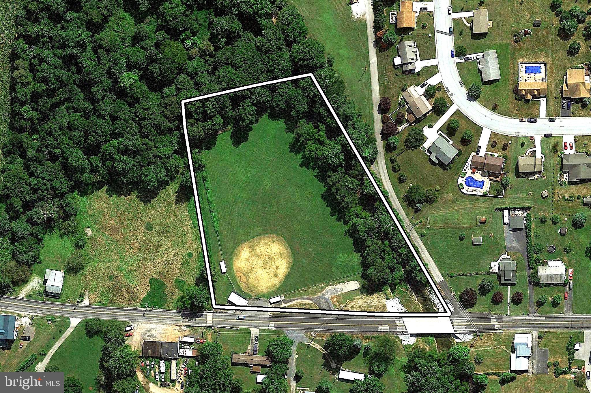Industrial Zoning   3.48 level acres near Arendtsville.  Upper Adams School District.   
Once a popular baseball field,  this parcel offers chain link fencing,  access to Conewago Creek, and great highway exposure.   Owner also may consider leasing.