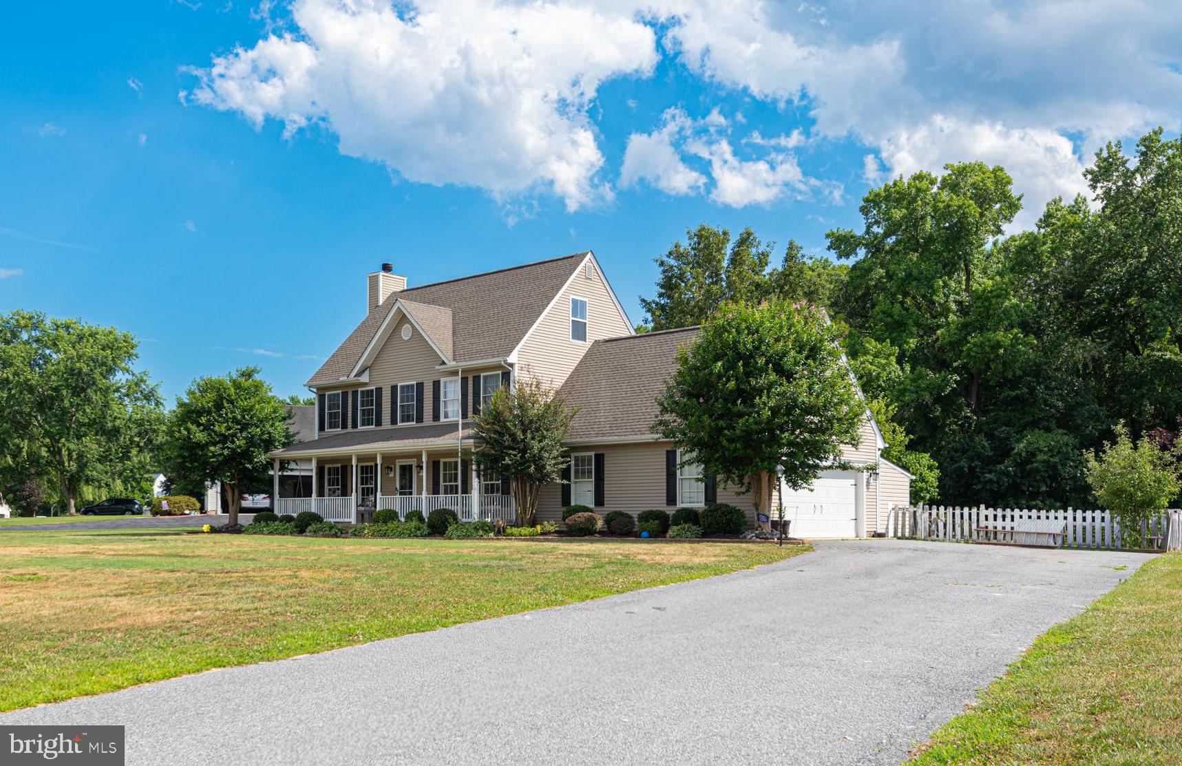 Welcome to Heather Glen, one of Salisbury's most desirable east-side communities in Wicomico County. Situated on an oversized .65-acre homesite, this well-appointed property offers exceptional indoor and outdoor living space. The expansive yard provides endless possibilities for recreation, gardening, outdoor sports, or the addition of an above-ground pool, while the multi-level deck, rear paver patio, and full-length front porch create inviting spaces for relaxing and entertaining.

The home features an attached two-car garage with additional room for storage, hobbies, or a workshop area. Inside, the first floor offers a spacious living room enhanced by luxury vinyl plank flooring, coffered ceilings, and a fireplace. The formal dining room showcases a custom built-in buffet cabinet, while the kitchen is equipped with updated countertops, updated appliances, a pantry, and a bright breakfast area. A large laundry room and convenient guest bath complete the main level.

Upstairs, the second floor includes four bedrooms, highlighted by a spacious owner's suite with a walk-in closet. The finished third floor provides a versatile bonus room featuring built-in bunk beds and custom drawer storage, making it ideal as a playroom, guest retreat, media room, or flex space.

Throughout the home, custom moldings and trim add architectural character, while thoughtfully designed closet systems with built-in shelving maximize organization and storage. Major updates provide peace of mind, including a roof that is only two years old, newer HVAC systems, and an encapsulated crawl space for improved efficiency.

Combining generous living space, quality finishes, important system updates, and an oversized lot, this Heather Glen property offers the perfect blend of comfort, functionality, and outdoor enjoyment.