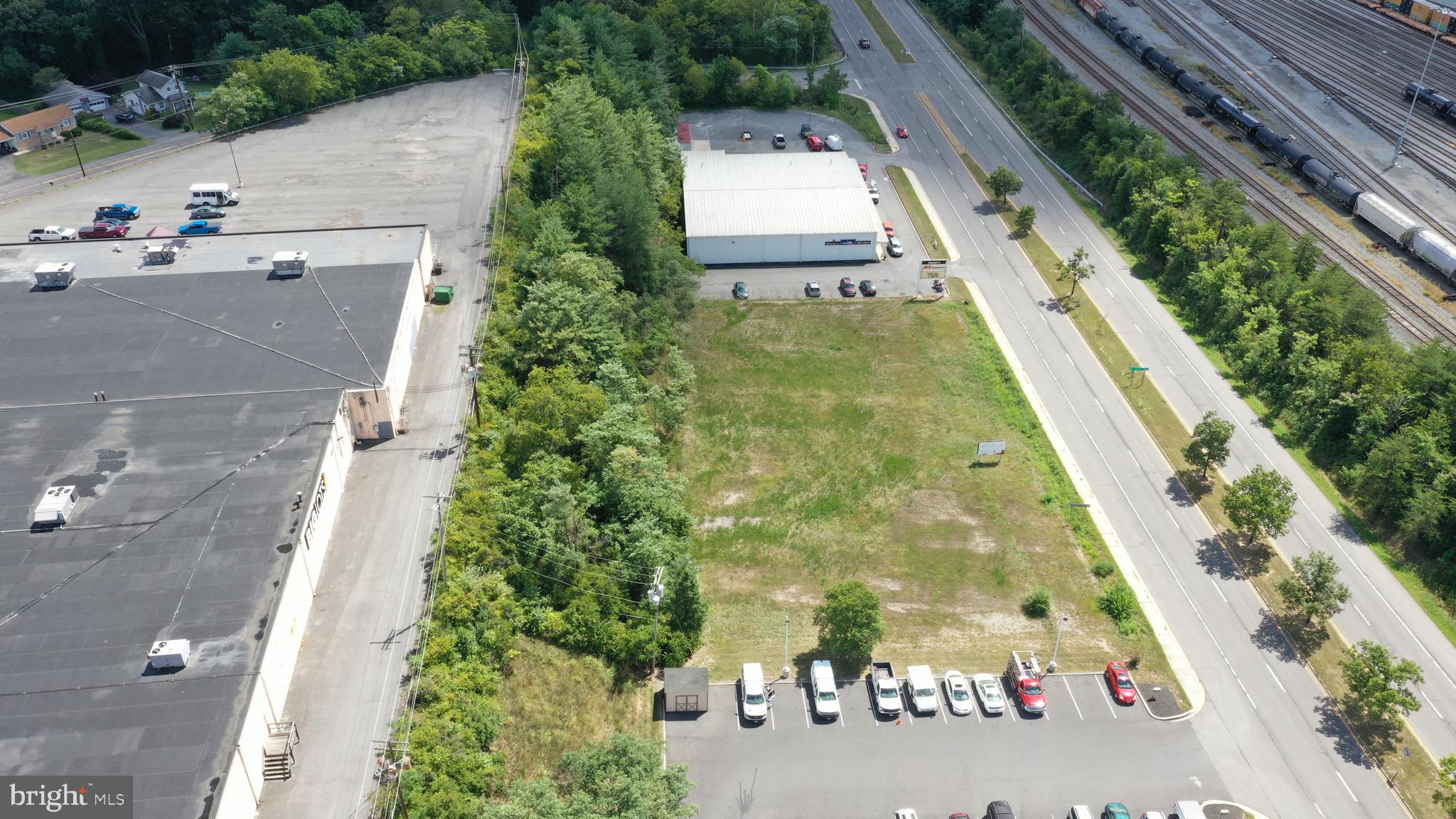 256' x 140' deep flat lot with all utilities and sidewalk in place. Highway entrance permits required with traffic study depending on use. Locate between Dairy Queen and True Value Hardware. over 11,000 cars a day and lots of homes and apartments within a mile. Business Highway allows most all retail fast food with drive through, banks etc. Car wash exclusion will be required.