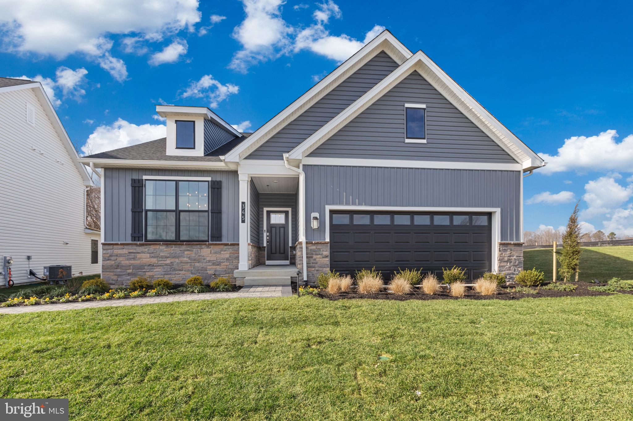 New construction ready for you this June!
Discover this brand-new 1,748 sq. ft. open-concept home in Pinegrove—La Plata’s most amenitized community. Featuring 3 spacious bedrooms, 2 full baths, 9’ ceilings, and a covered back porch, this modern ranch-style layout offers comfort, convenience, and room to grow.

The gourmet kitchen shines with gray cabinetry, quartz countertops, stainless-steel appliances, a walk-in pantry, and an oversized island that opens to the bright living and dining areas—perfect for everyday living and gatherings. The private owner’s suite includes a large walk-in closet, double-bowl vanity, and walk-in shower. Two guest bedrooms and a stylish full bath sit at the front of the home, ideal for family, guests, or a home office.

Enjoy a dedicated laundry room with washer and dryer, a two-car garage, included window treatments, and a Smart Home® package powered by ADT.

Pinegrove offers a peaceful neighborhood feel and the opportunity to stop renting and start building equity and long-term wealth through homeownership. Modern living, community connection, and a smart financial future—welcome home!