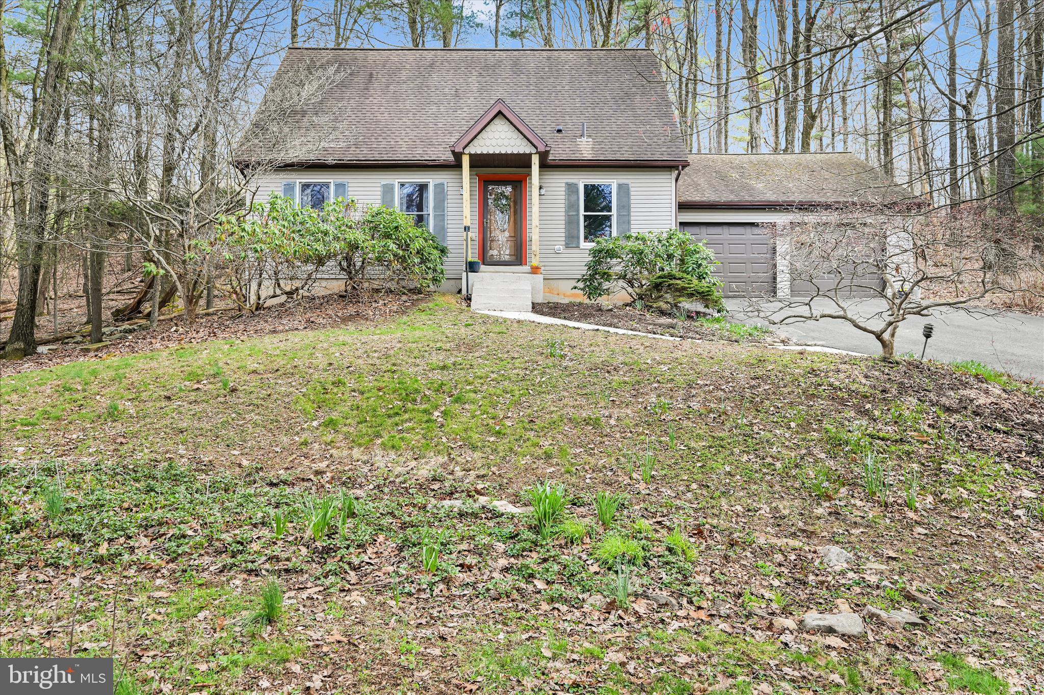 Welcome to this beautiful home in the sought-after Lake Wynonah community, perfectly situated on a private lot—plus an additional adjacent lot offering an extra 0.3 acres for added space and privacy.  Inside, you’ll find a warm and inviting interior featuring both a spacious living room and family room with hardwood floors, along with durable tile flooring throughout key areas. A dedicated office space provides the perfect setup for working from home or managing day-to-day tasks. Stay cozy during the colder months with a Harman coal stove, adding both efficiency and charm to the home. A spacious 2-car garage adds everyday convenience.  Step outside to a large screened-in patio—perfect for entertaining, summer BBQs, or simply relaxing and enjoying peaceful evenings with family and friends.  This gated community offers a wide range of amenities, including a lodge with dining, bar, and gathering/library space, boating, and fishing. Enjoy tennis and pickleball courts, a community pool, parks, pavilions, scenic hiking trails, a marina with beautiful docks, and abundant natural wildlife.  Enjoy a vibrant community conveniently located less than an hour to Allentown, Harrisburg, Hershey, and Reading—and just 1.5 hours to Philadelphia.  Schedule your private showing today!  *Please call the Lake Wynonah Business Office for updates on the "big lake"/Lake Wynonah Dam rehabilitation project and probable future assessment.*  SELLER IS WILLING TO OFFER 15K BUYER CREDIT FOR PROBABLE LAKE WYNONAH DAM REHABILITATION ASSESSMENT.