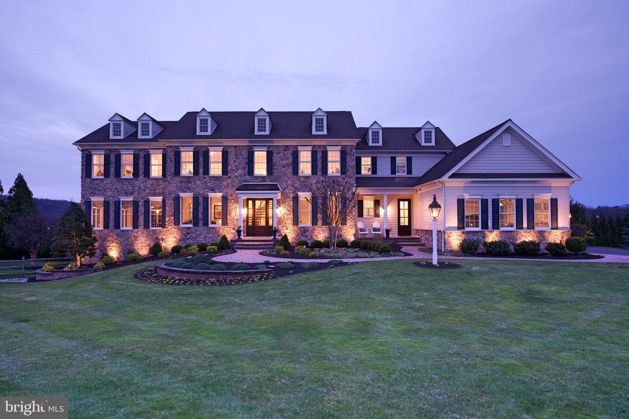 Welcome to Dutchess Farm Estates, where luxury living reaches its pinnacle! Nestled in highly-coveted Upper Makefield, this spectacular property offers an unparalleled experience in refined living. Prepare to be captivated by the breathtaking Jericho Mountain views that envelop this exquisite home, allowing you to witness the beauty of each season like never before.

From the moment you arrive, you'll be greeted by picturesque landscaping and an enchanting curb appeal that sets the stage for an extraordinary living experience. Step inside and be greeted by a grand two-story entrance foyer, adorned with a curved staircase and gleaming hardwood floors, beckoning you to explore further.

Every inch of this home has been thoughtfully designed with meticulous attention to detail. The neutral decor, intricate moldings, wainscoting, and columns exude elegance, while the hardwood flooring and abundant windows bathe the space in natural light, offering glimpses of the unique views that make this home so special. 

Indulge in the pleasures of entertainment with a charming living room that leads to a fabulous conservatory, complete with a full wet bar, wine storage, and a Bose home theater sound system—an absolute must for those who appreciate five-star hospitality!

Unwind in the generous yet cozy great room, featuring a coffered ceiling and an inviting fireplace—a perfect gathering spot for family and friends. The newly renovated gourmet kitchen is a culinary haven, boasting a large island with counter seating, a breakfast area with built-ins, and a serene ambiance to start your day on a delicious note. Completing the first level is an elegant dining room, a butler's pantry, a powder room, a spacious laundry room, and a private study—a harmonious blend of functionality and luxury.

Ascend to the second level and discover the spectacular master bedroom suite, an oasis of tranquility with a spacious sitting room, walk-in closets, and a luxurious newly renovated bath, offering the ultimate retreat from the world. Four additional bedrooms, each with its own private bathroom, provide comfort and privacy for family members and guests alike.

The lower level of this extraordinary home is an entertainer's dream, featuring a sprawling walkout basement with ample storage, a full bath, a large exercise area, and a wet bar. Whether you're a hobbyist, fitness enthusiast, or lover of games and sports, this versatile space offers endless possibilities for enjoyment.

Step outside and experience a vacation-like atmosphere in your own backyard. Immerse yourself in lush landscaping, find solace under the magnificent pergola with a handsome stone fireplace, and luxuriate in the inviting heated pool and spa area—a true outdoor oasis that completes this stunning residence.

Located within the award-winning Council Rock School District, this property combines luxury, comfort, and convenience in one remarkable package. Don't miss out on this special opportunity to call this splendid property your own. Embrace the lifestyle you deserve—schedule your viewing today and embark on a journey towards unparalleled luxury living at Dutchess Farm Estates!