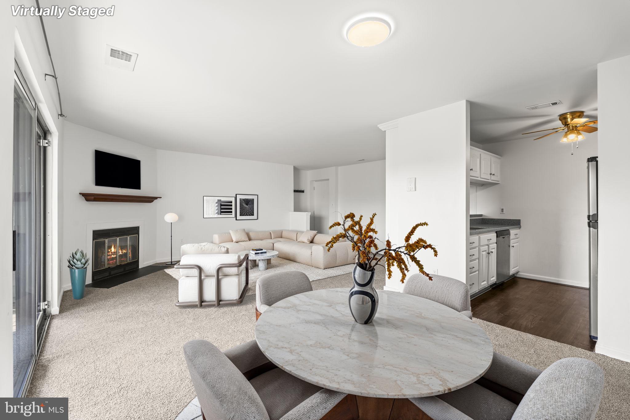 Move right into this spacious, thoughtfully updated condo with a bright, open layout that instantly feels like home. The inviting living room features a cozy electric fireplace and opens to a covered balcony - perfect for a quiet start or end to your day. The fully equipped kitchen flows seamlessly into the main living space, while two generously sized bedrooms offer comfort and flexibility. The primary suite includes a private full bath with a brand-new shower enclosure, along with an additional full bathroom for added convenience. Enjoy year-round comfort with a brand-new HVAC system. Community amenities include a swimming pool, playground, and tennis courts—everything you need for easy, low-maintenance living.