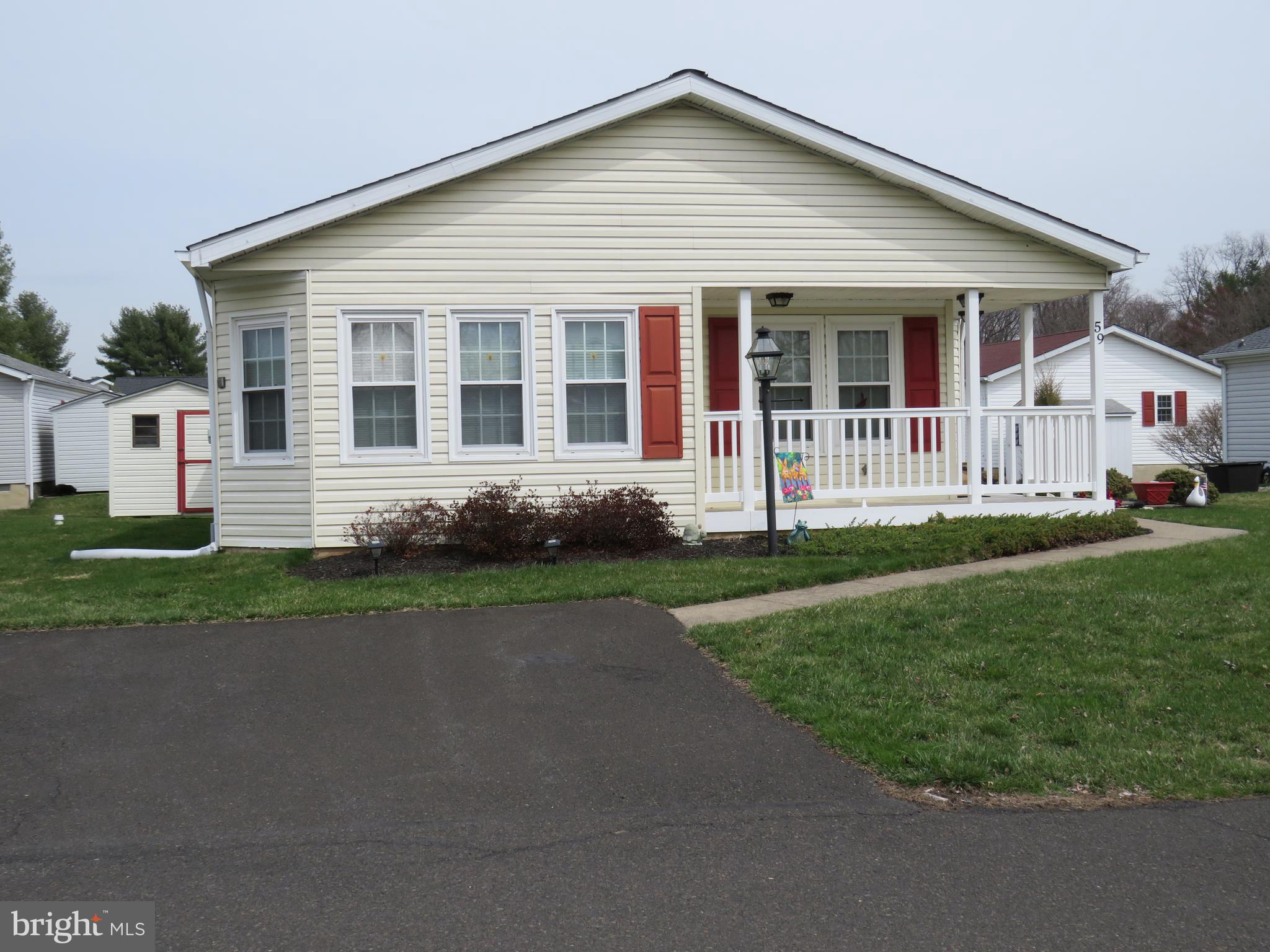 Welcome home to this beautifully updated and meticulously maintained Chalfont model in the desirable Villages of Buckingham Springs. This move-in ready home has been thoughtfully upgraded throughout, offering both comfort and peace of mind.

Major exterior improvements include a new roof and siding (2018), along with a low-maintenance Trex front porch—perfect for relaxing outdoors.

Step inside to a welcoming foyer with a convenient coat closet, leading into a bright and spacious living room. The formal dining room flows seamlessly into the updated kitchen, featuring a stunning backsplash, upgraded appliances, and easy access to the cozy breakfast room.

The laundry room offers added functionality with a built-in desk area and extra cabinetry for storage, and provides direct access to a side patio complete with a retractable awning—ideal for outdoor enjoyment.

Down the hall, you’ll find a fully updated hall bathroom with a new tub, toilet, and flooring. Bedroom two is generously sized and includes two closets. At the end of the hall, the primary suite offers a peaceful retreat with a large walk-in closet and a private bath featuring a soaking tub, separate shower, and an updated double vanity with new sinks and countertop.

With so many updates already completed, this home is truly ready for you to move in and make it your own.
