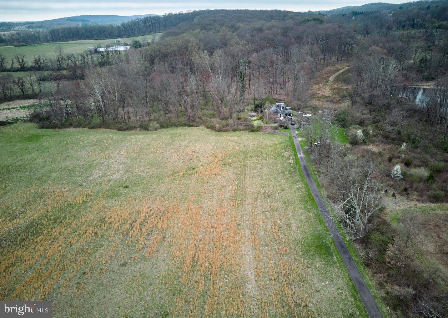 Become the next fortunate Buyer to purchase and reside in one of the most sought after areas in Solebury. Surrounded by exquisite estates making up over 1,200 acres of deed restricted preserved parcels, this bucolic property offers the best of all worlds and Location. Accessed down an 800 foot drive the home is secluded offering peace and tranquility, a respite, an escape from the busy world. If you are looking for a permanent residence or weekend retreat, without the requirements associated with maintaining a hundred acres, this is the parcel. There is an existing residence which will be replaced with a newly built residence. The Property is being offered with design build opportunities starting at $1,400,000. If you are looking for a exceptionally designed and crafted home, with every detail developed to meet and exceed your expectations, Polo Design Build will work with you to this end.  Polo is offering to design a special home in styles from Ultra Modern, Concrete Steel and Glass to Mid Century Modern, Craftsman Style, to breathtaking Cottage Style.